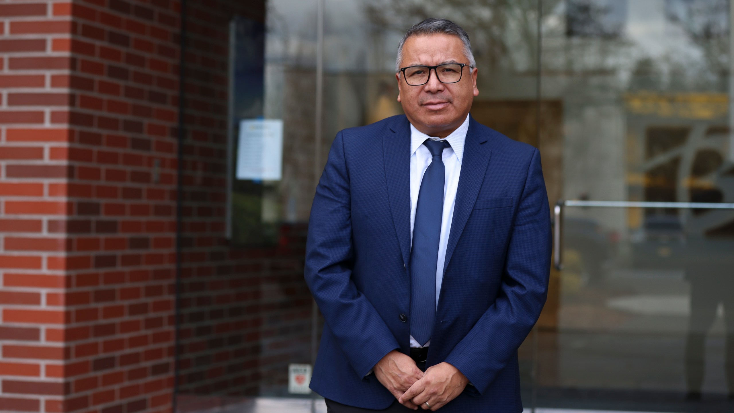 Gustavo Balderas, superintendent of Beaverton School District, stands for a photo outside of the Beaverton school district administrative office in Beaverton, Ore., Monday, Nov. 25, 2024. (AP Photo/Amanda Loman)