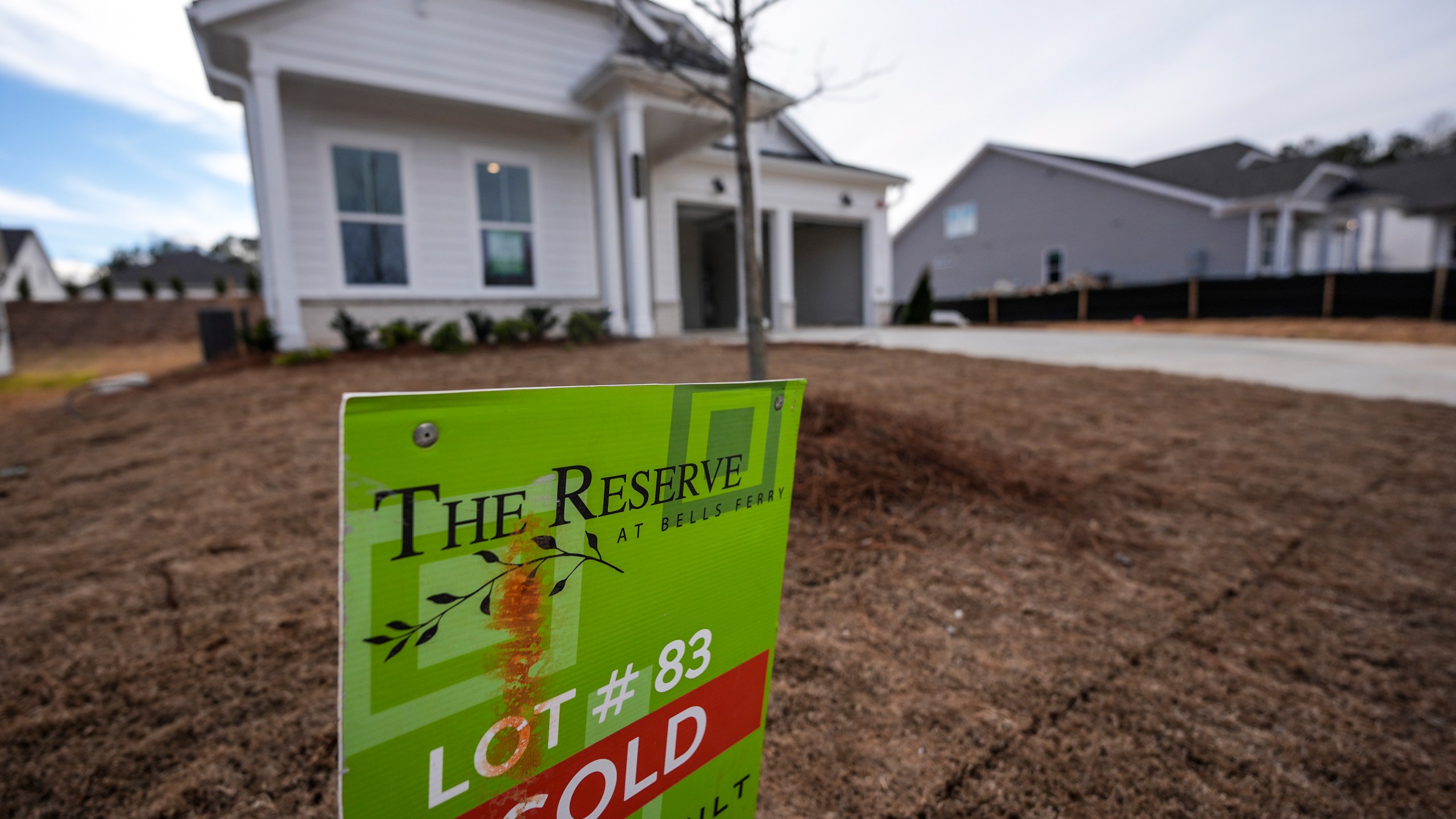 FILE - A sign announces the sale of a new home, Jan. 16, 2024, in Kennesaw, Ga. (AP Photo/Mike Stewart, File)