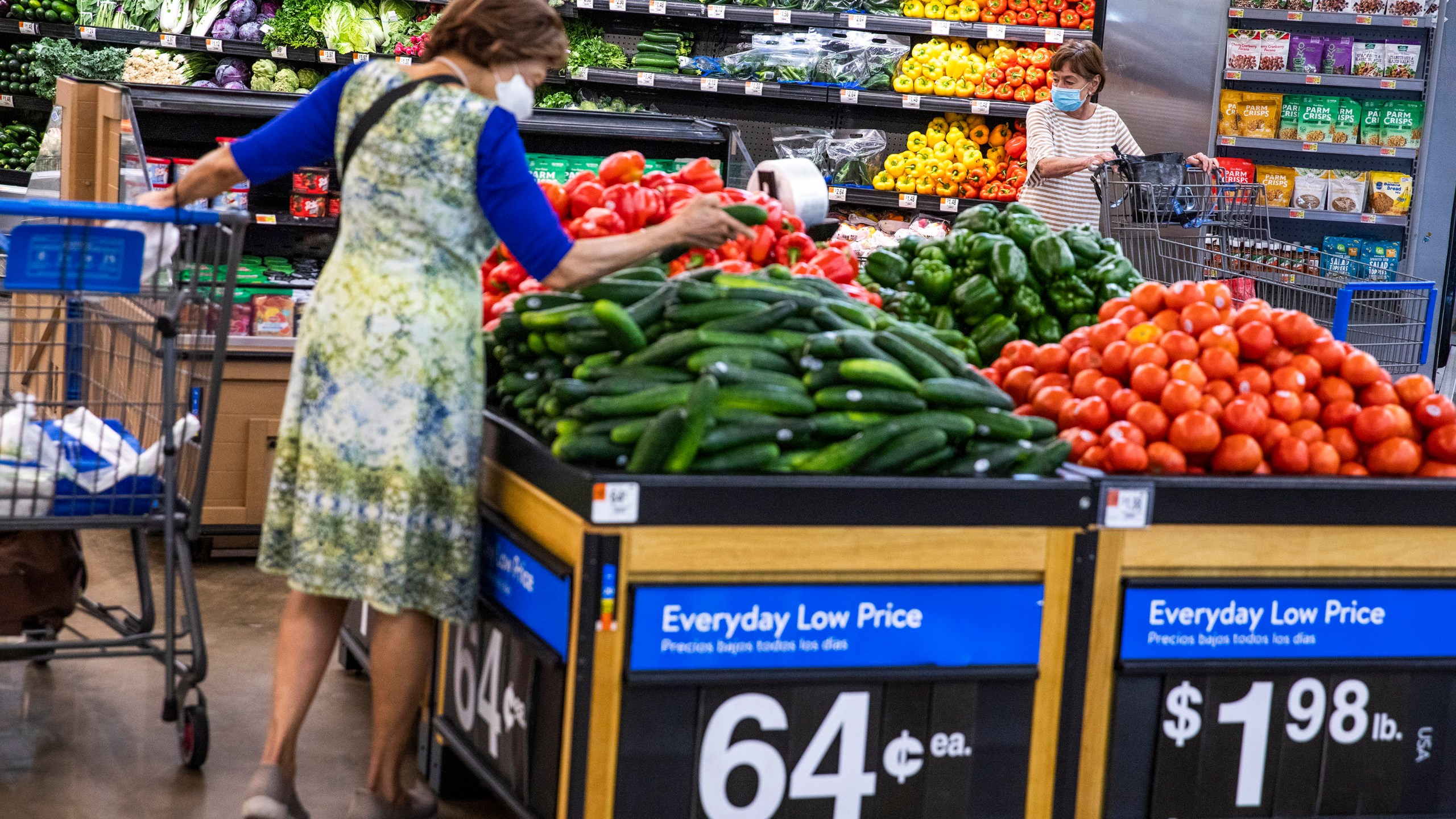 FILE - People buy groceries at a Walmart Superstore in Secaucus, New Jersey, July 11, 2024. (AP Photo/Eduardo Munoz Alvarez, File)