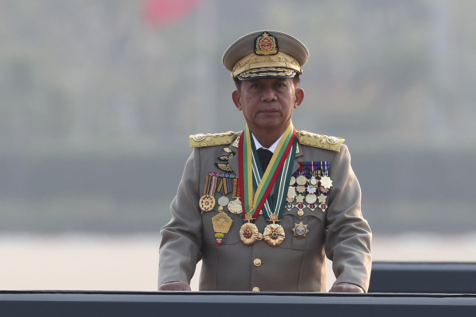 FILE - Senior Gen. Min Aung Hlaing, head of the military council, inspects officers during a parade to commemorate Myanmar's 78th Armed Forces Day in Naypyitaw, Myanmar, on March 27, 2023. (AP Photo/Aung Shine Oo, File)