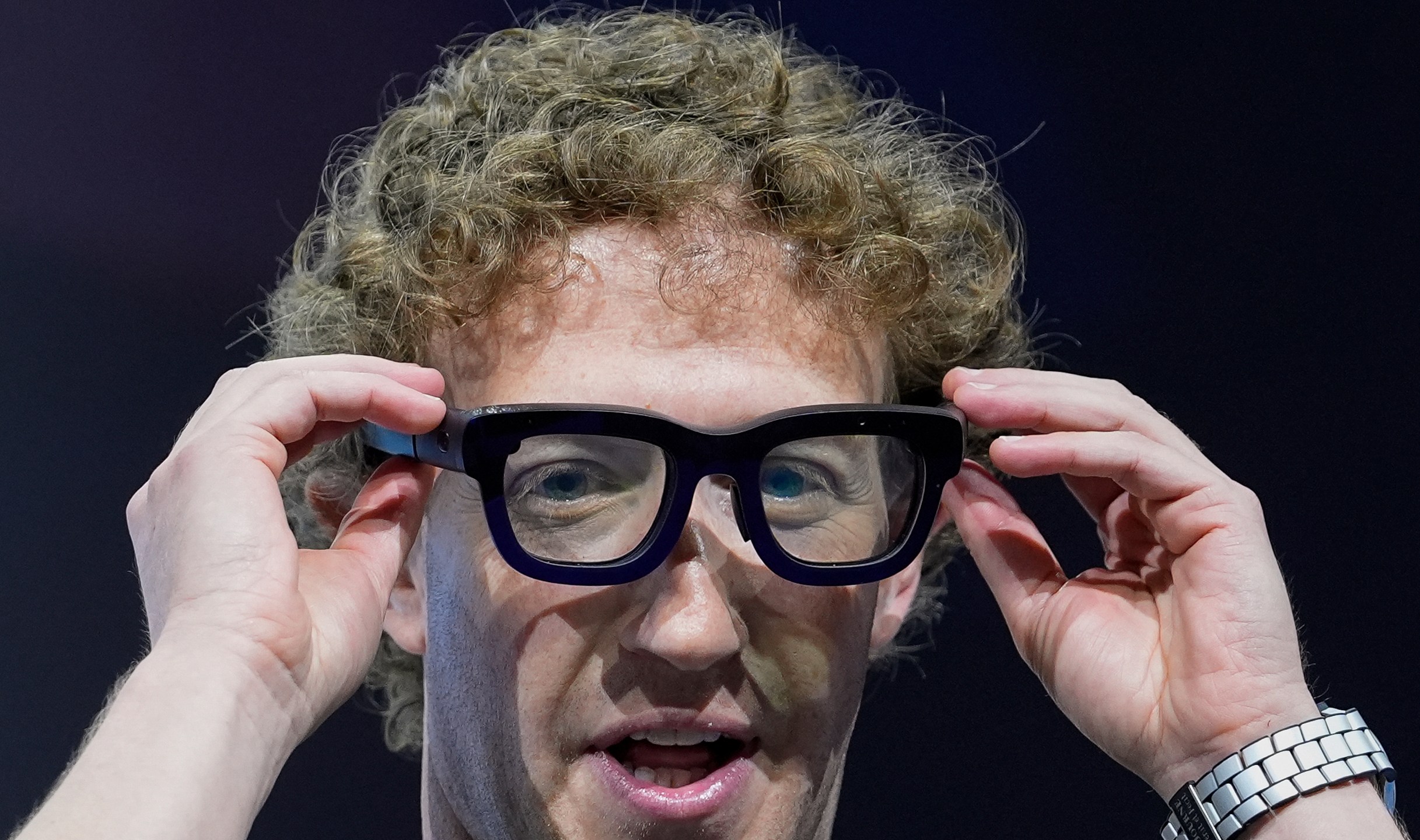 FILE - Mark Zuckerberg wears a pair of Orion AR glasses during the Meta Connect conference on Sept. 25, 2024, in Menlo Park, Calif. (AP Photo/Godofredo A. Vásquez, File)