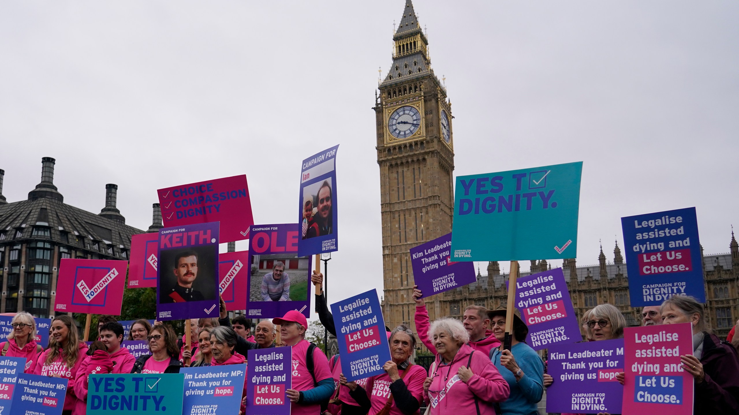 FILE - A small demonstration by people advocating assisted dying hold a protest outside the Hoses of Parliament as a bill to legalise assisted dying is to be put before lawmakers in London, England, Oct. 16, 2024. (AP Photo/Alberto Pezzali, File)