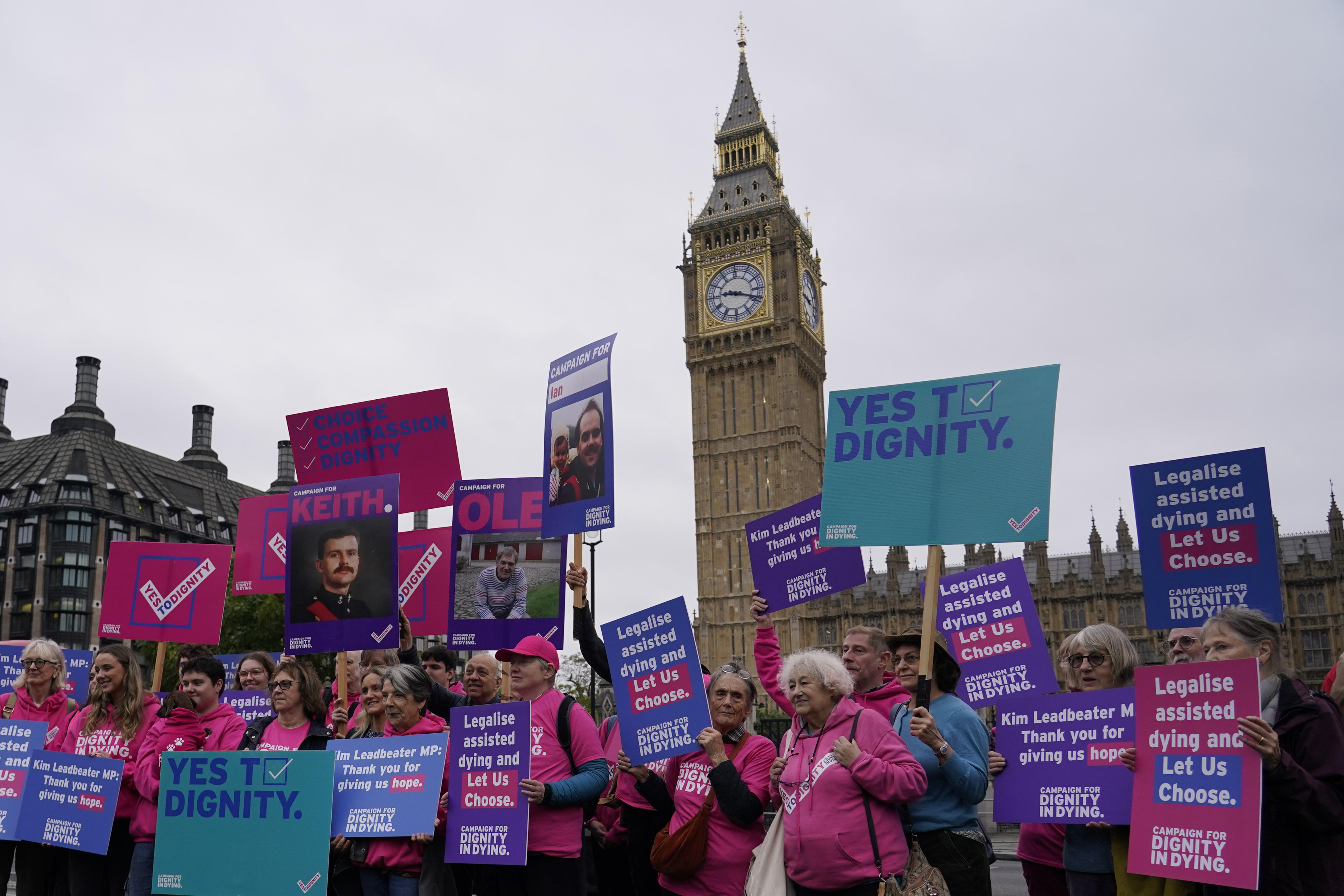 FILE - A small demonstration by people advocating assisted dying hold a protest outside the Hoses of Parliament as a bill to legalise assisted dying is to be put before lawmakers in London, England, Oct. 16, 2024. (AP Photo/Alberto Pezzali, File)