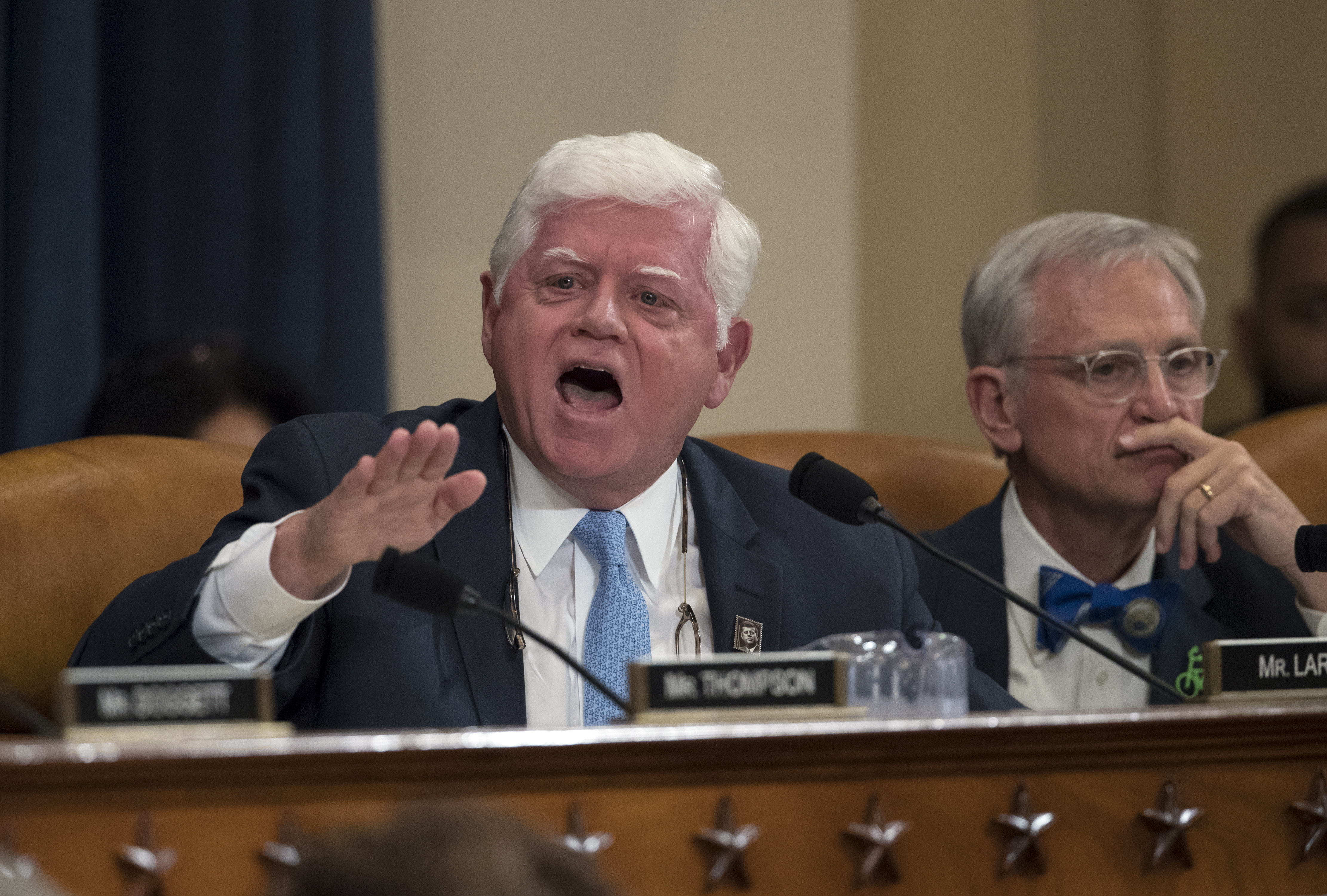 FILE - Rep. John Larson, D-Conn., joined at right by Rep. Earl Blumenauer, D-Ore., questions House Ways and Means Committee Chairman Kevin Brady, R-Texas, on Capitol Hill in Washington, Nov. 6, 2017. (AP Photo/J. Scott Applewhite, File)