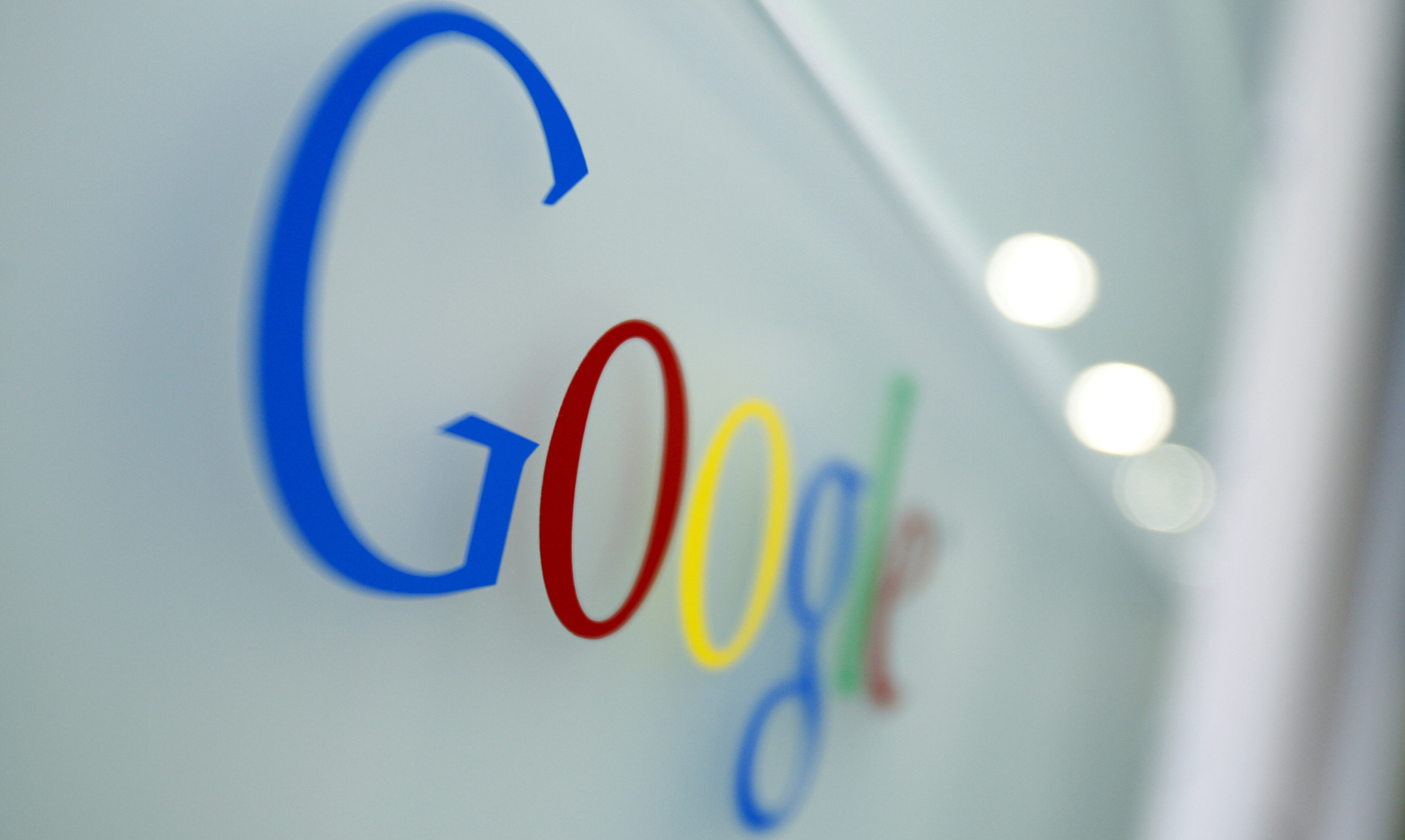 FILE - The Google logo is seen at the Google headquarters in Brussels, March 23, 2010. (AP Photo/Virginia Mayo, File)