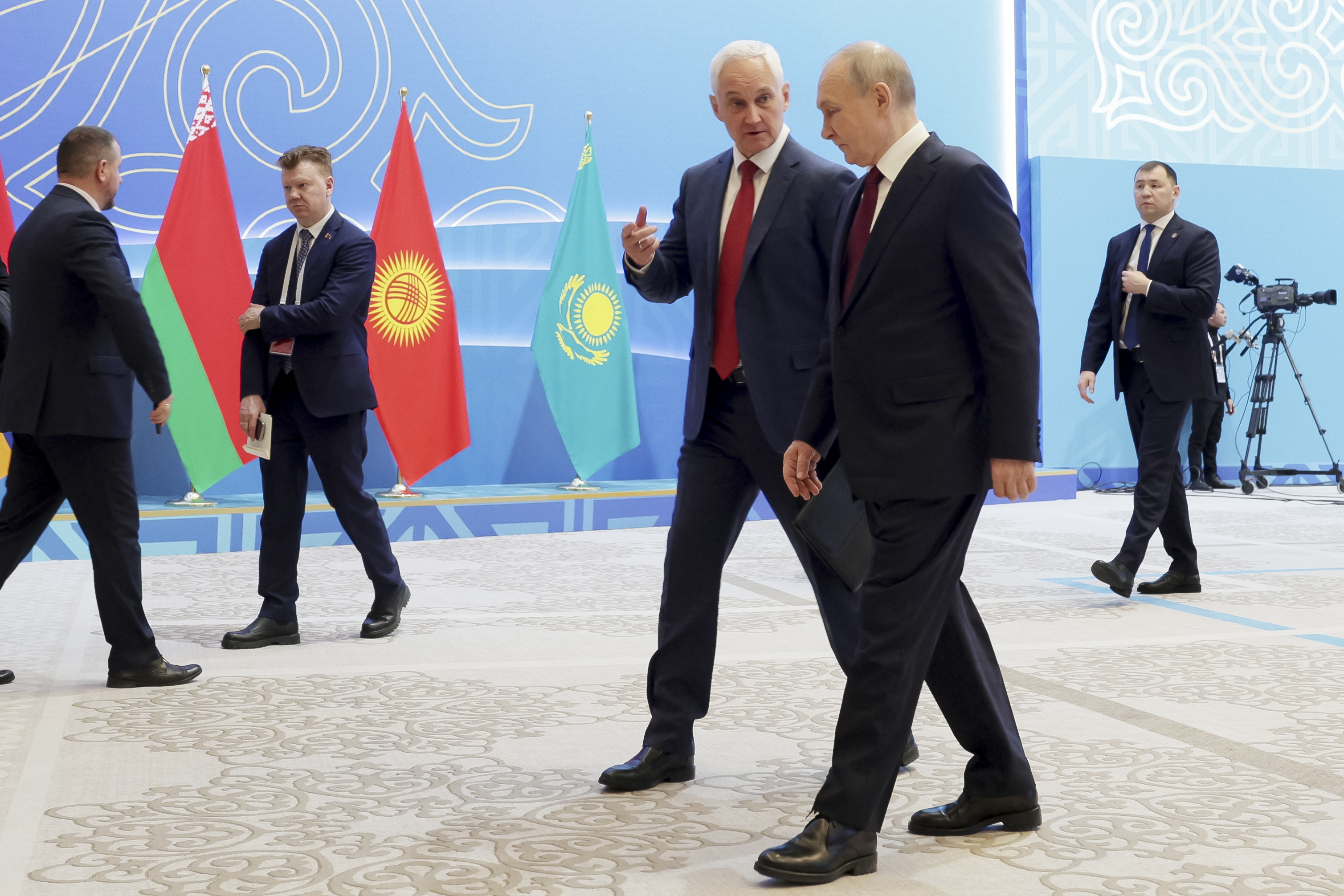 Russian President Vladimir Putin, right, listens to Russian Defense Minister Andrei Belousov as they walk on the sidelines of the summit of the Collective Security Treaty Organisation (CSTO) in Astana, Kazakhstan, Thursday, Nov. 28, 2024. (Gavriil Grigorov, Sputnik, Kremlin Pool Photo via AP)