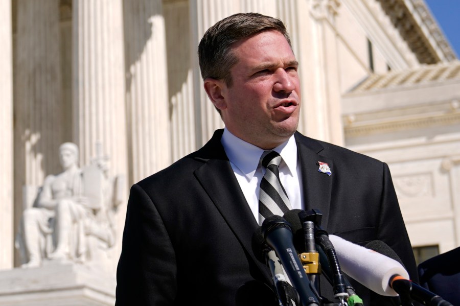 FILE - Missouri Attorney General Andrew Bailey speaks with reporters outside the U.S. Supreme Court, Feb. 28, 2023, on Capitol Hill in Washington. (AP Photo/Patrick Semansky, File)