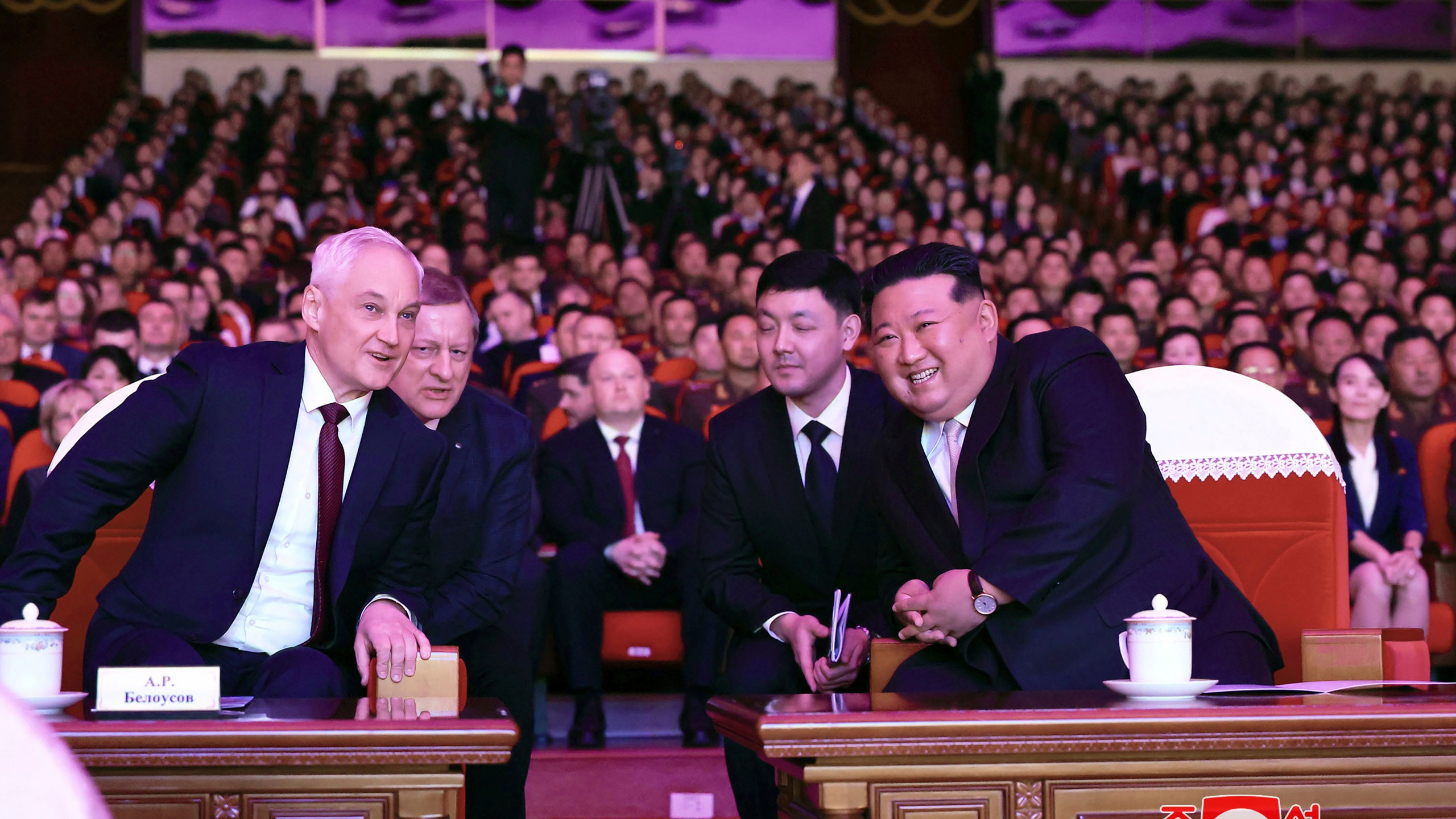 In this photo provided by the North Korean government, North Korean leader Kim Jong Un, right, and Russian Defense Minister Andrei Belousov, left, watch a performance to welcome Russian military delegation in Pyongyang, North Korea Friday, Nov. 29, 2024. Independent journalists were not given access to cover the event depicted in this image distributed by the North Korean government. The content of this image is as provided and cannot be independently verified. Korean language watermark on image as provided by source reads: "KCNA" which is the abbreviation for Korean Central News Agency. (Korean Central News Agency/Korea News Service via AP)