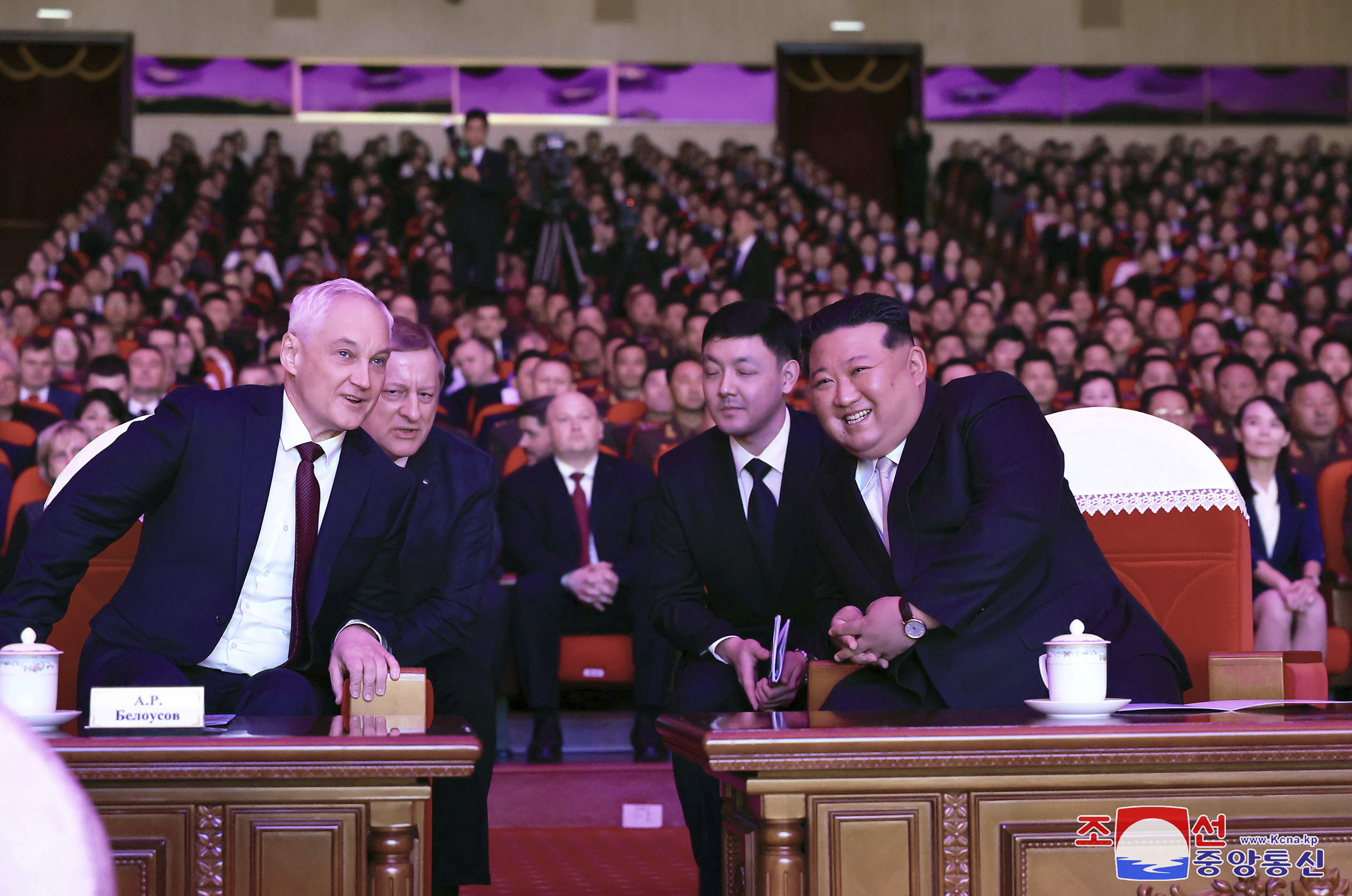 In this photo provided by the North Korean government, North Korean leader Kim Jong Un, right, and Russian Defense Minister Andrei Belousov, left, watch a performance to welcome Russian military delegation in Pyongyang, North Korea Friday, Nov. 29, 2024. Independent journalists were not given access to cover the event depicted in this image distributed by the North Korean government. The content of this image is as provided and cannot be independently verified. Korean language watermark on image as provided by source reads: "KCNA" which is the abbreviation for Korean Central News Agency. (Korean Central News Agency/Korea News Service via AP)