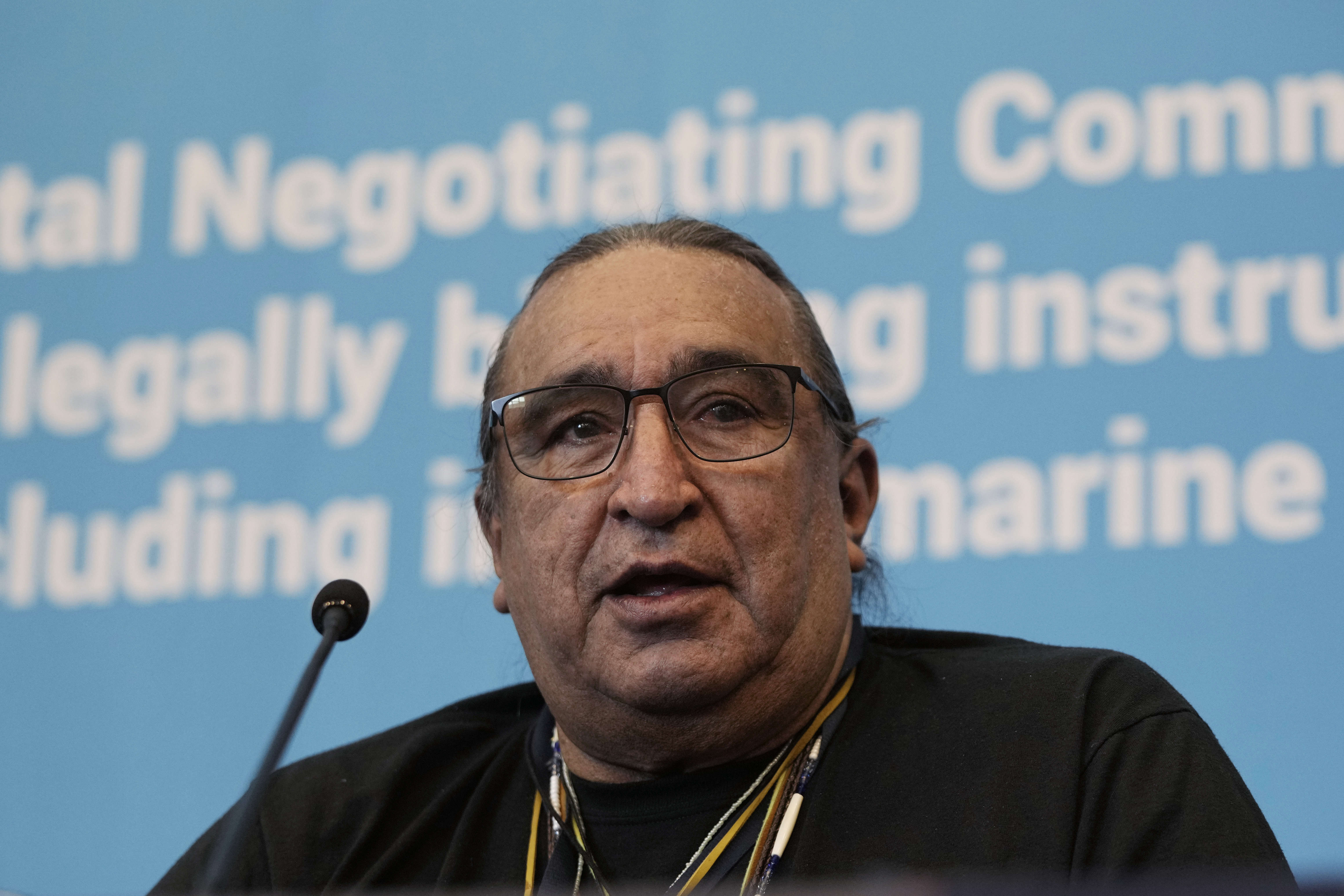 Juan Benito Marcias, a member of The International Indigenous Peoples' Forum on Plastic, speaks during a press conference at the fifth session of the Intergovernmental Negotiating Committee on Plastic Pollution in Busan, South Korea, Saturday, Nov. 30 2024. (AP Photo/Ahn Young-joon)