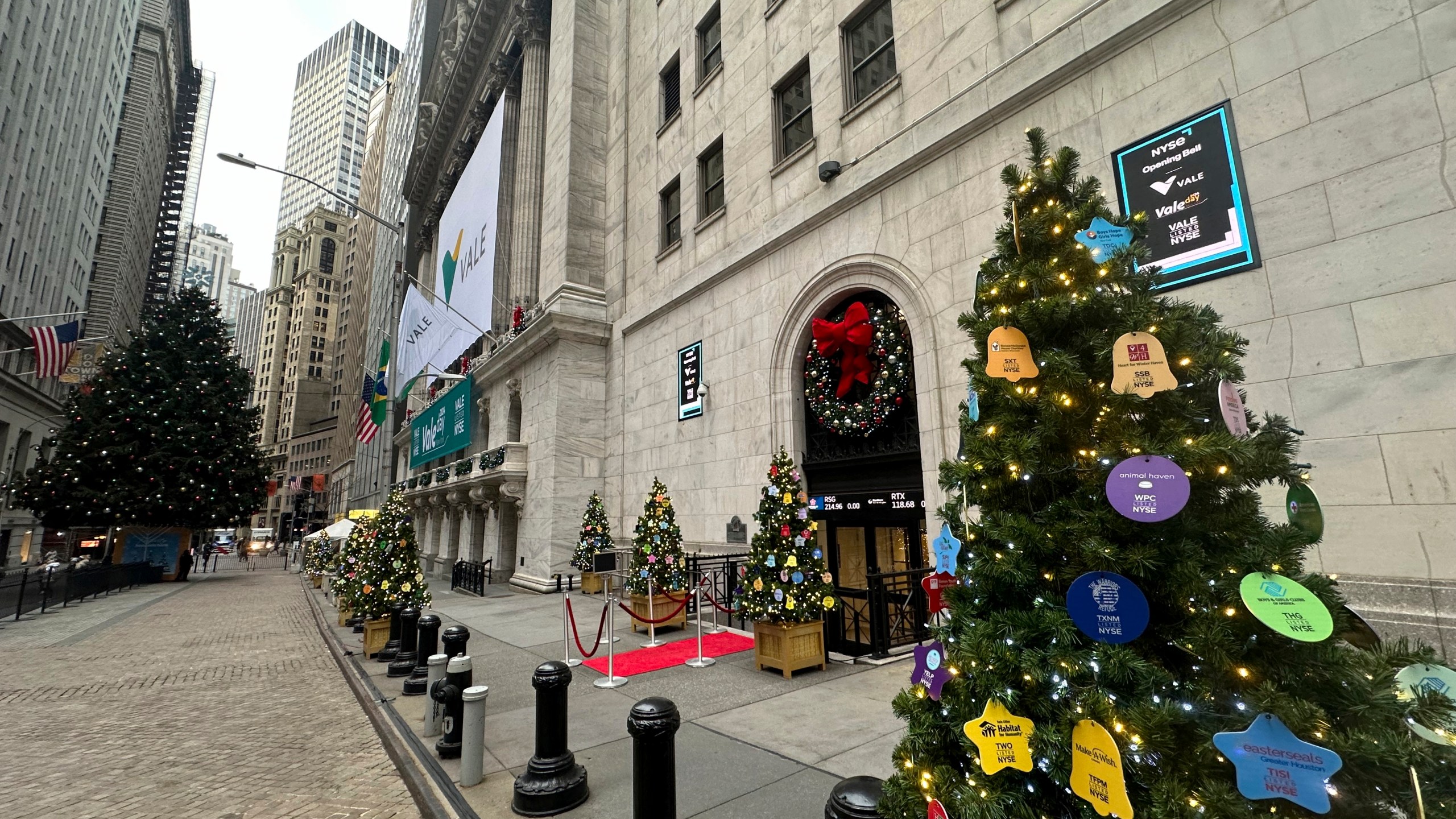 Holiday decorations are shown in front of the New York Stock Exchange in New York's Financial District on Tuesday, Dec. 3, 2024. (AP Photo/Peter Morgan)