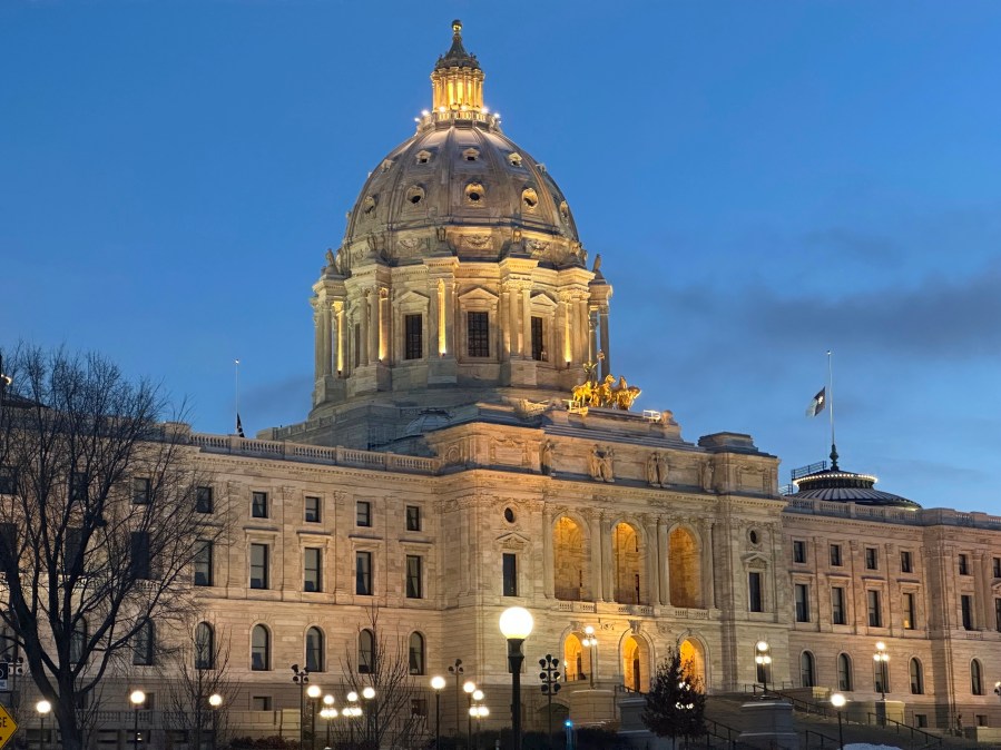 The Minnesota State Capitol in St. Paul, Minn. which contains the state Supreme Court chamber, is shown before sunrise on Tuesday, Dec. 3, 2024. (AP Photo/Steve Karnowski)