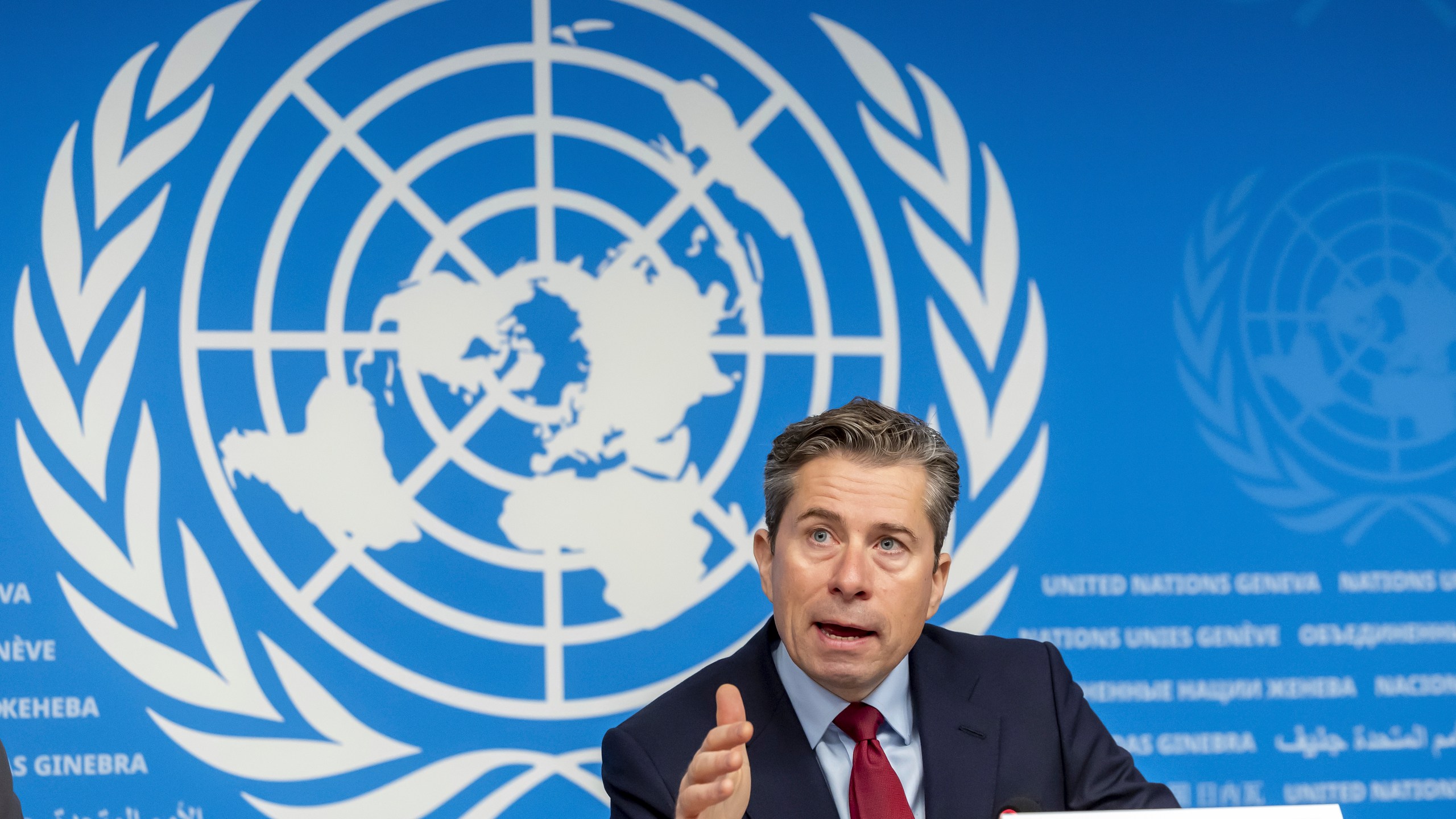 Tom Fletcher, Under-Secretary-General for Humanitarian Affairs and Emergency Relief Coordinator, talks to the media about the Global Humanitarian Overview 2025 and the UN annual humanitarian appeal, during a press conference at the European headquarters of the United Nations in Geneva, Switzerland, Tuesday, Dec. 3, 2024. (Salvatore Di Nolfi/Keystone via AP)