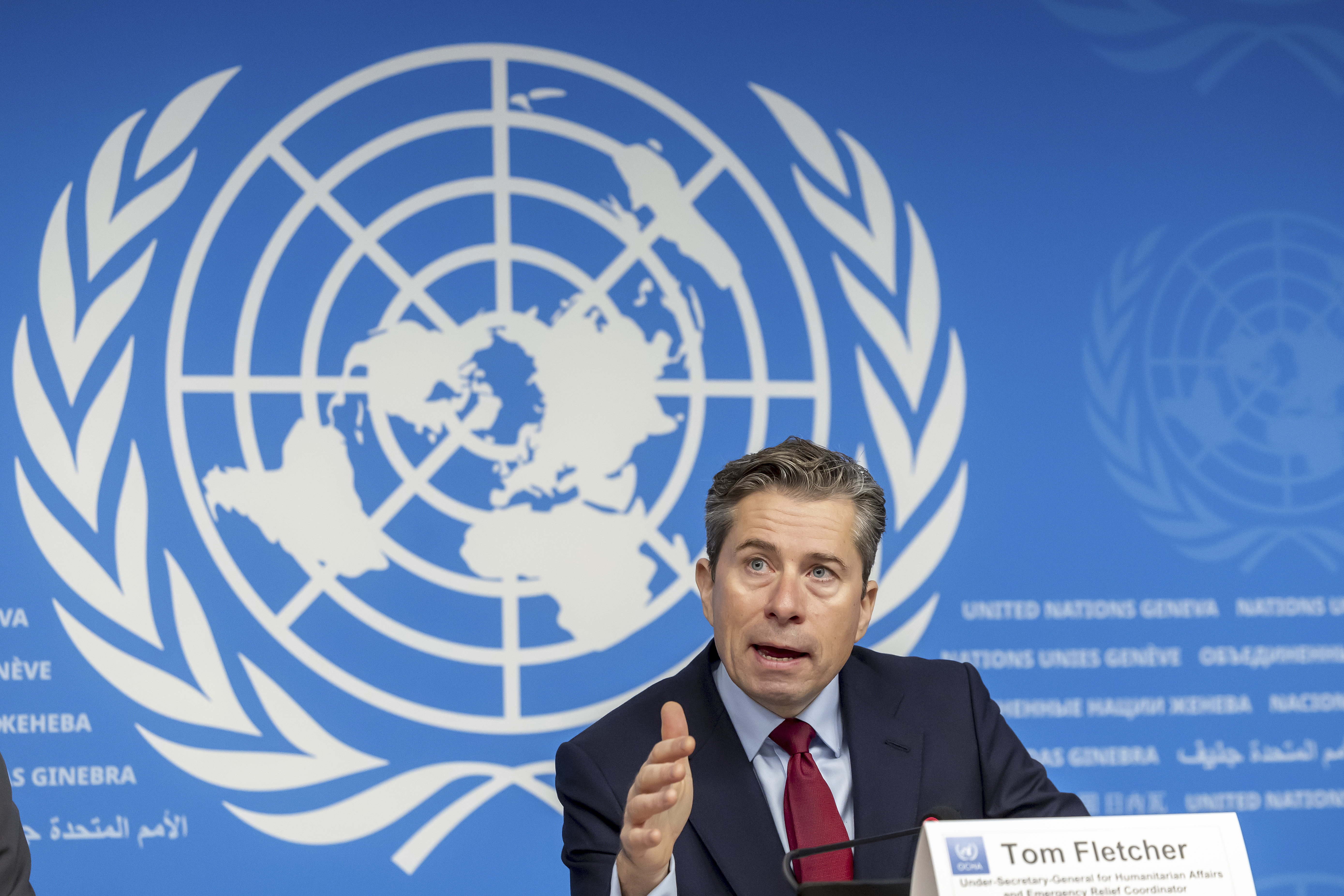 Tom Fletcher, Under-Secretary-General for Humanitarian Affairs and Emergency Relief Coordinator, talks to the media about the Global Humanitarian Overview 2025 and the UN annual humanitarian appeal, during a press conference at the European headquarters of the United Nations in Geneva, Switzerland, Tuesday, Dec. 3, 2024. (Salvatore Di Nolfi/Keystone via AP)