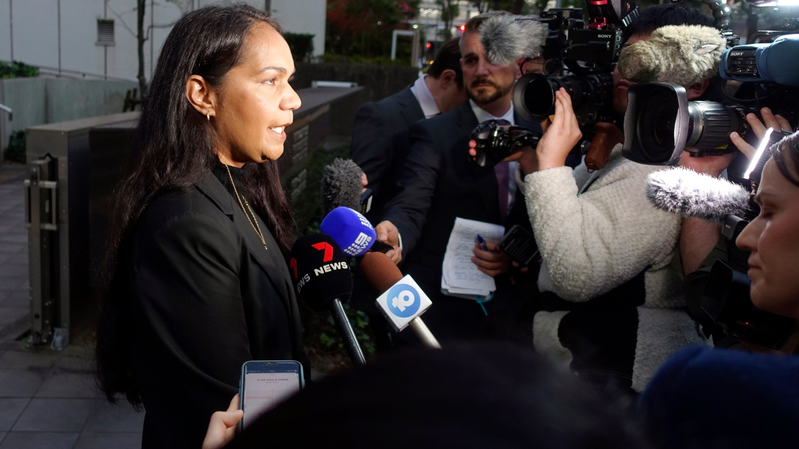 Kristal Hilaire, a daughter of Australian citizen Donna Nelson, speaks to reporters at the Chiba District Court after the verdict for Nelson in a drug smuggling case, Wednesday, Dec. 4, 2024, in Chiba, east of Tokyo. (AP Photo/Mari Yamaguchi)