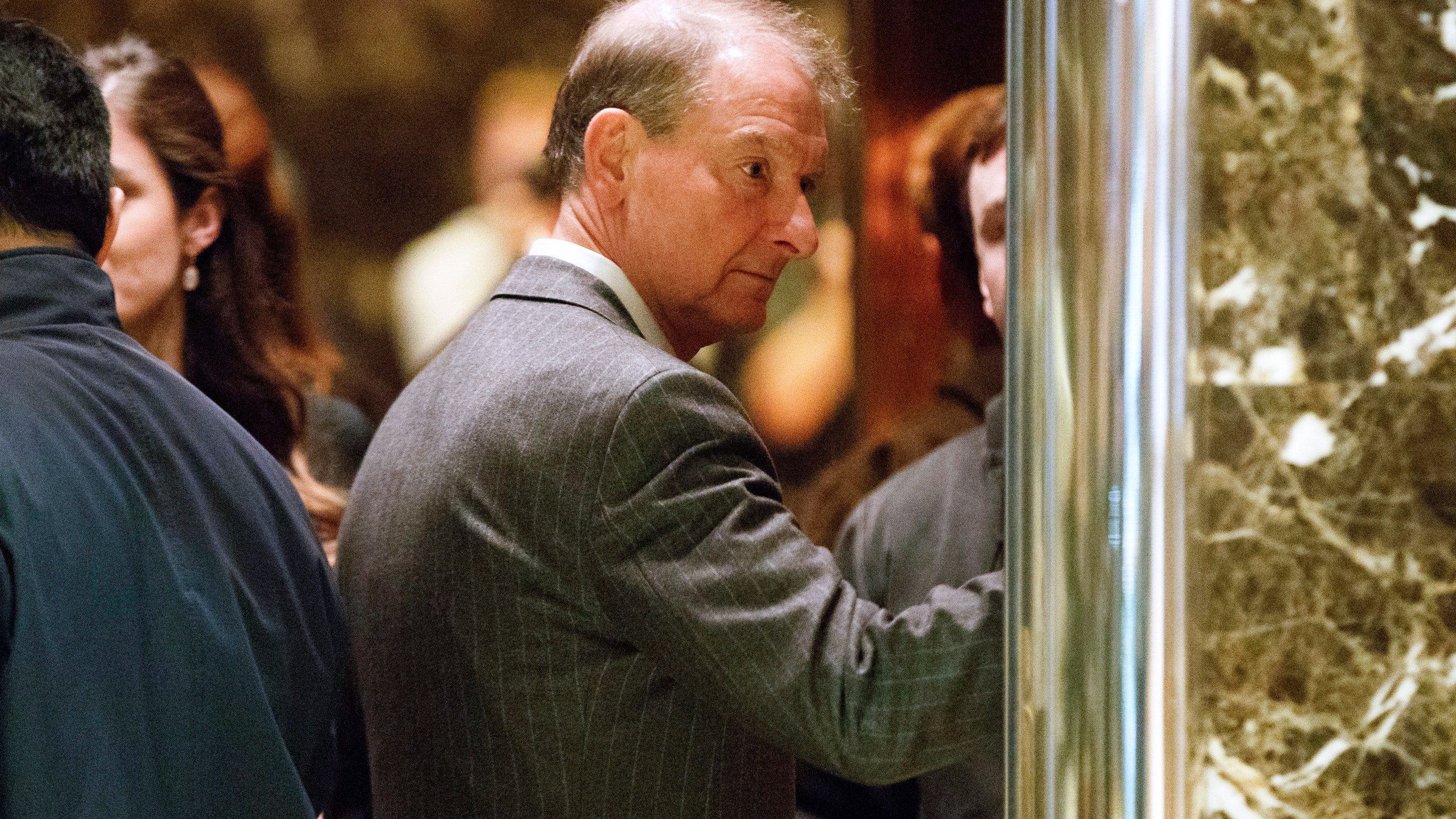 FILE - Paul Atkins, a former SEC Commissioner and current CEO of Patomak Partners, arrives at Trump Tower, Nov. 28, 2016, in New York. (AP Photo/ Evan Vucci, File)