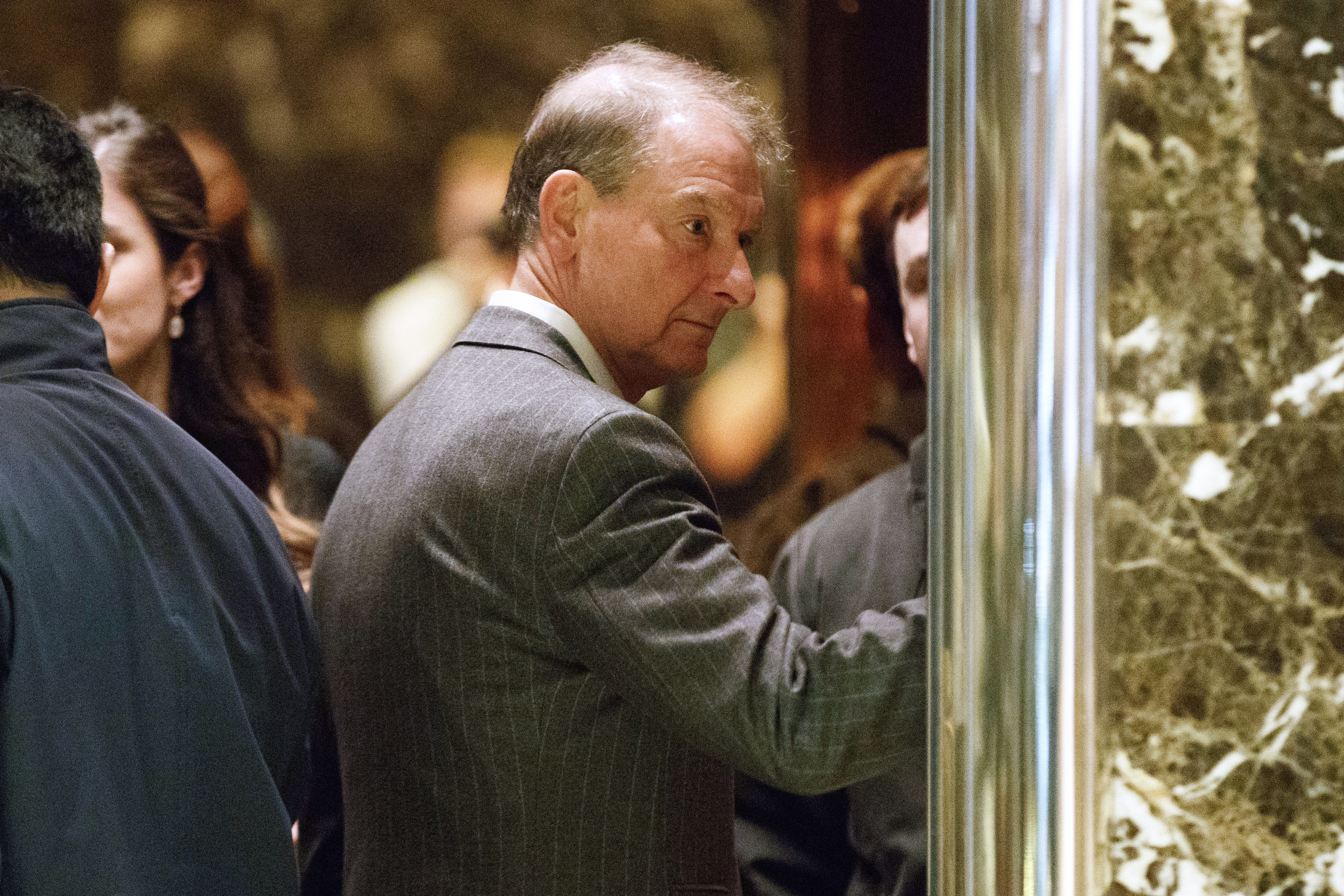 FILE - Paul Atkins, a former SEC Commissioner and current CEO of Patomak Partners, arrives at Trump Tower, Nov. 28, 2016, in New York. (AP Photo/ Evan Vucci, File)