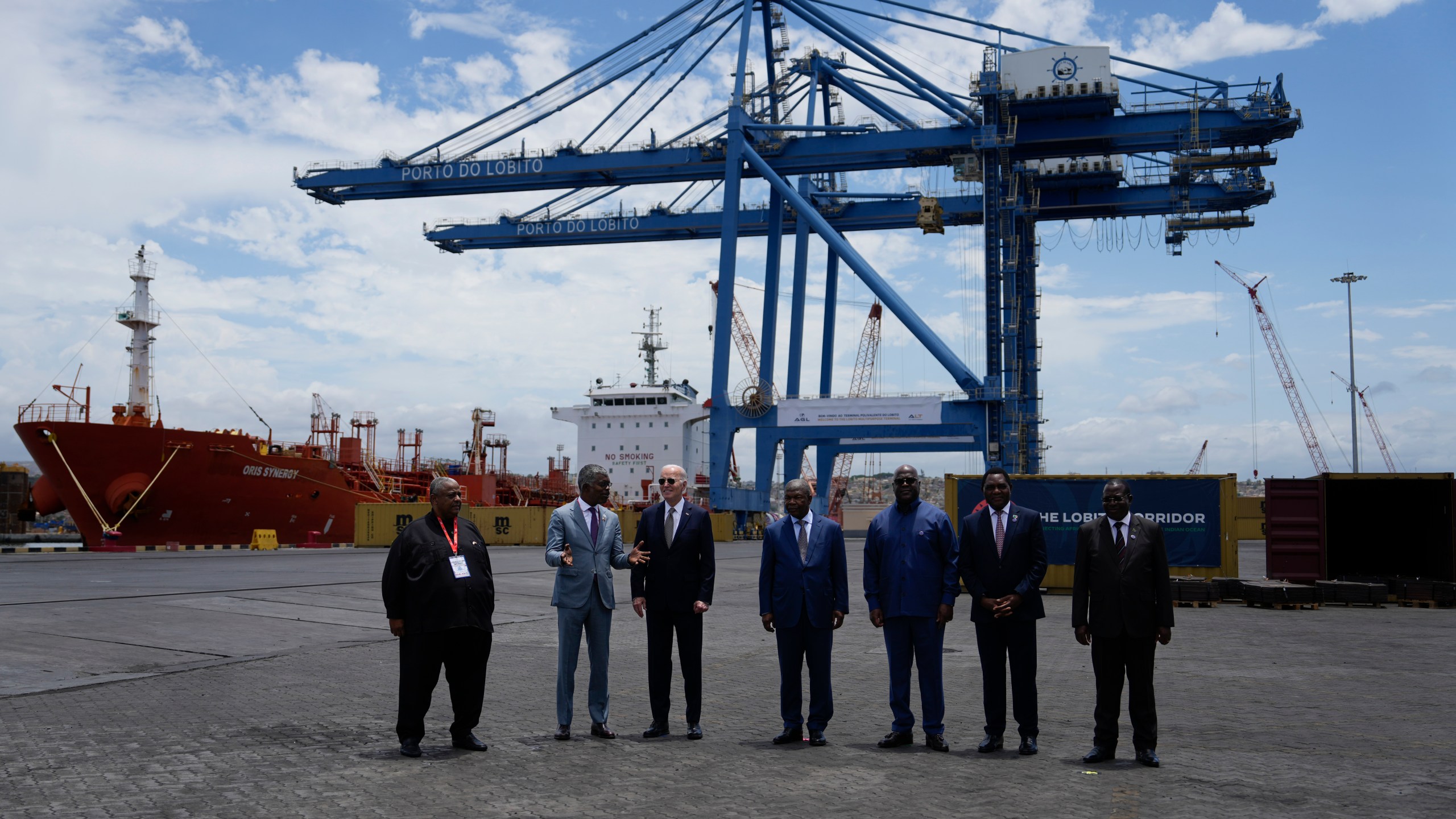 Angolan Minister of Transport Ricardo Daniel speaks to President Joe Biden accompanied by, from his left, President Joao Lourenco of the Republic of Angola, President Felix Tshisekedi of the Democratic Republic of the Congo, President Hakainde Hichilema of the Republic of Zambia and Vice President Philip Mpango of the United Republic of Tanzania during a tour of the Lobito Port Terminal, in Lobito, Angola, on Wednesday, Dec. 4, 2024. (AP Photo/Ben Curtis)