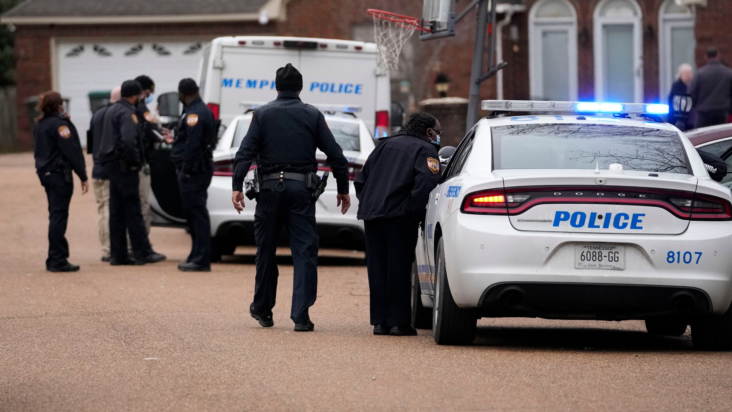 FILE - Members of the Memphis Police Department work a crime scene in Memphis, Tenn., Tuesday, Jan. 24, 2023. (AP Photo/Gerald Herbert, File)