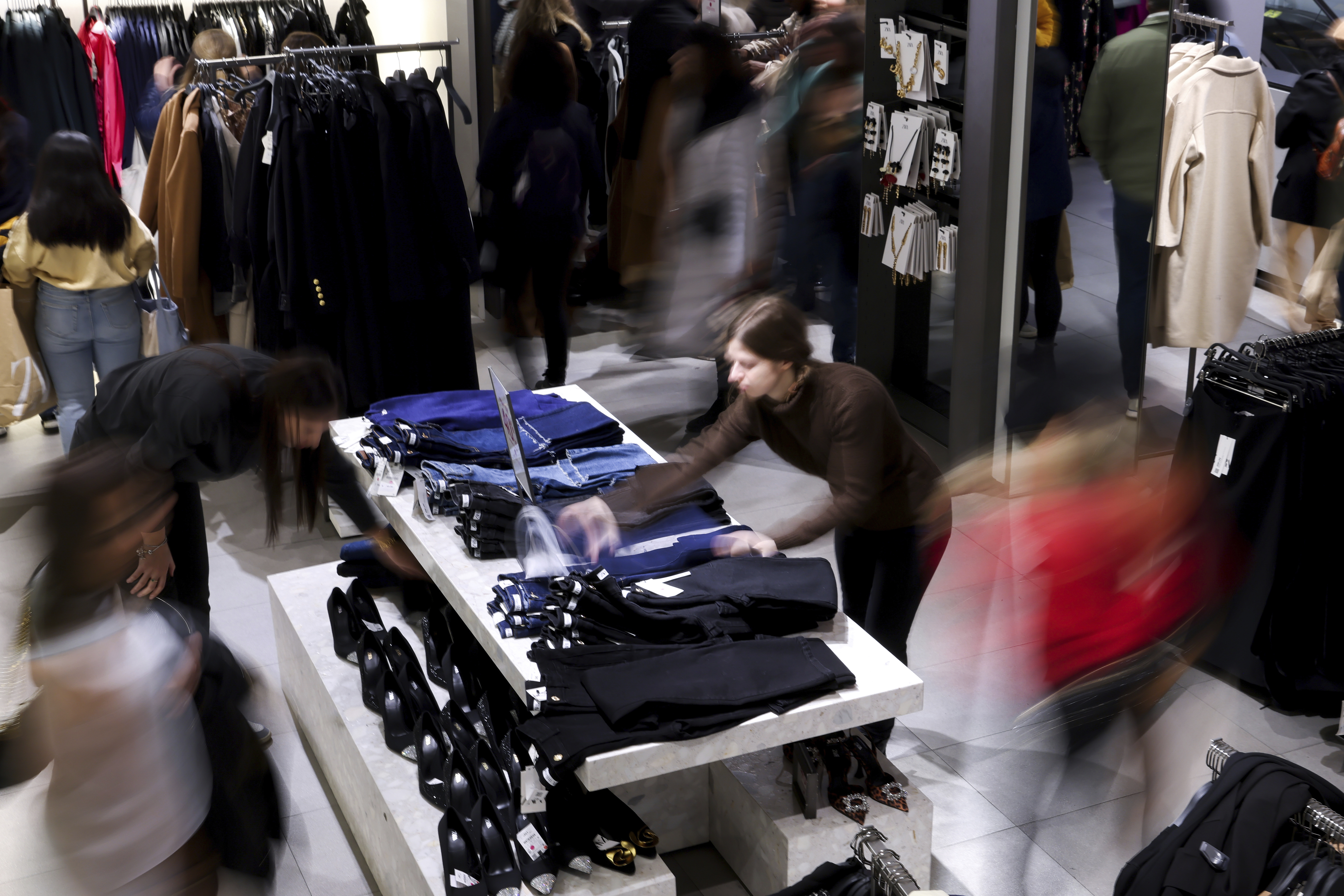 FILE - A display of clothes is organized at a retail store on Nov. 25, 2022, in New York. (AP Photo/Julia Nikhinson, File)