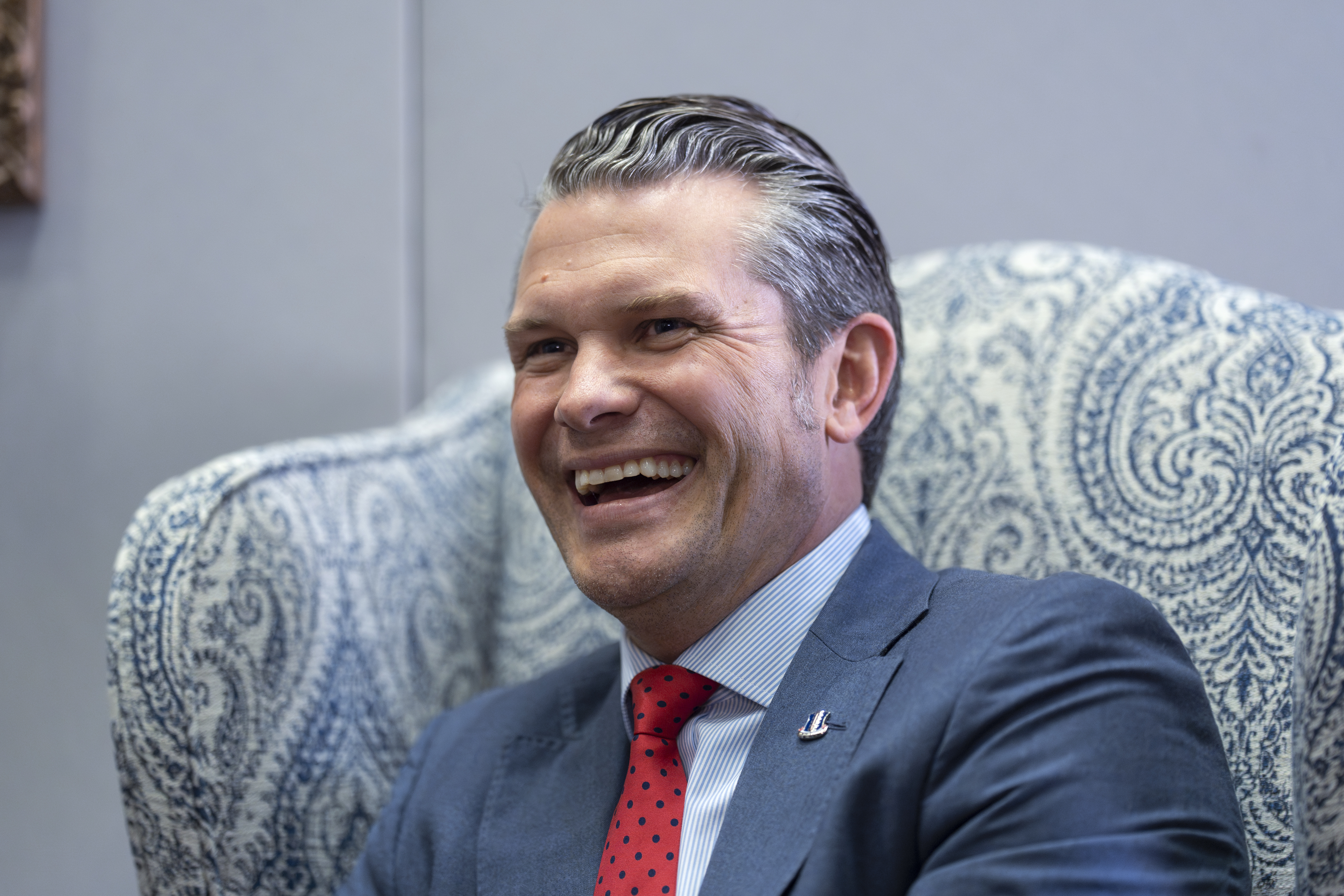 Pete Hegseth, President-elect Donald Trump's nominee to be defense secretary, responds to reporters during a meeting with Sen. Mike Rounds, R-S.D., a member of the Senate Armed Services Committee, at the Capitol in Washington, Thursday, Dec. 5, 2024. (AP Photo/J. Scott Applewhite)