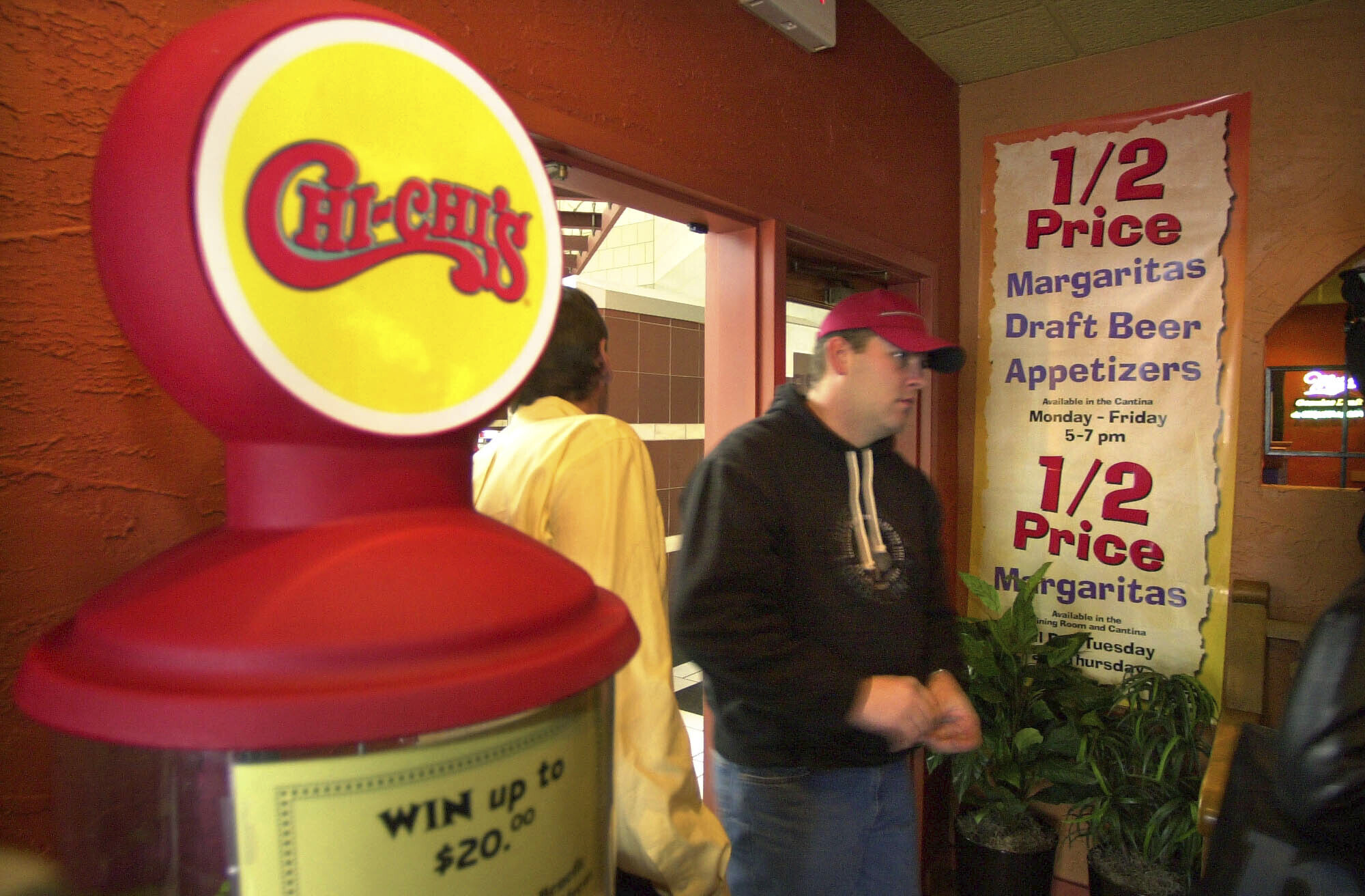 FILE - An unidentified man arrives at the Chi-Chi's Mexican Restaurant in the Beaver Valley Mall on Jan. 15, 2004, in Monaca, Pa. (AP Photo/Gene J. Puskar, File)