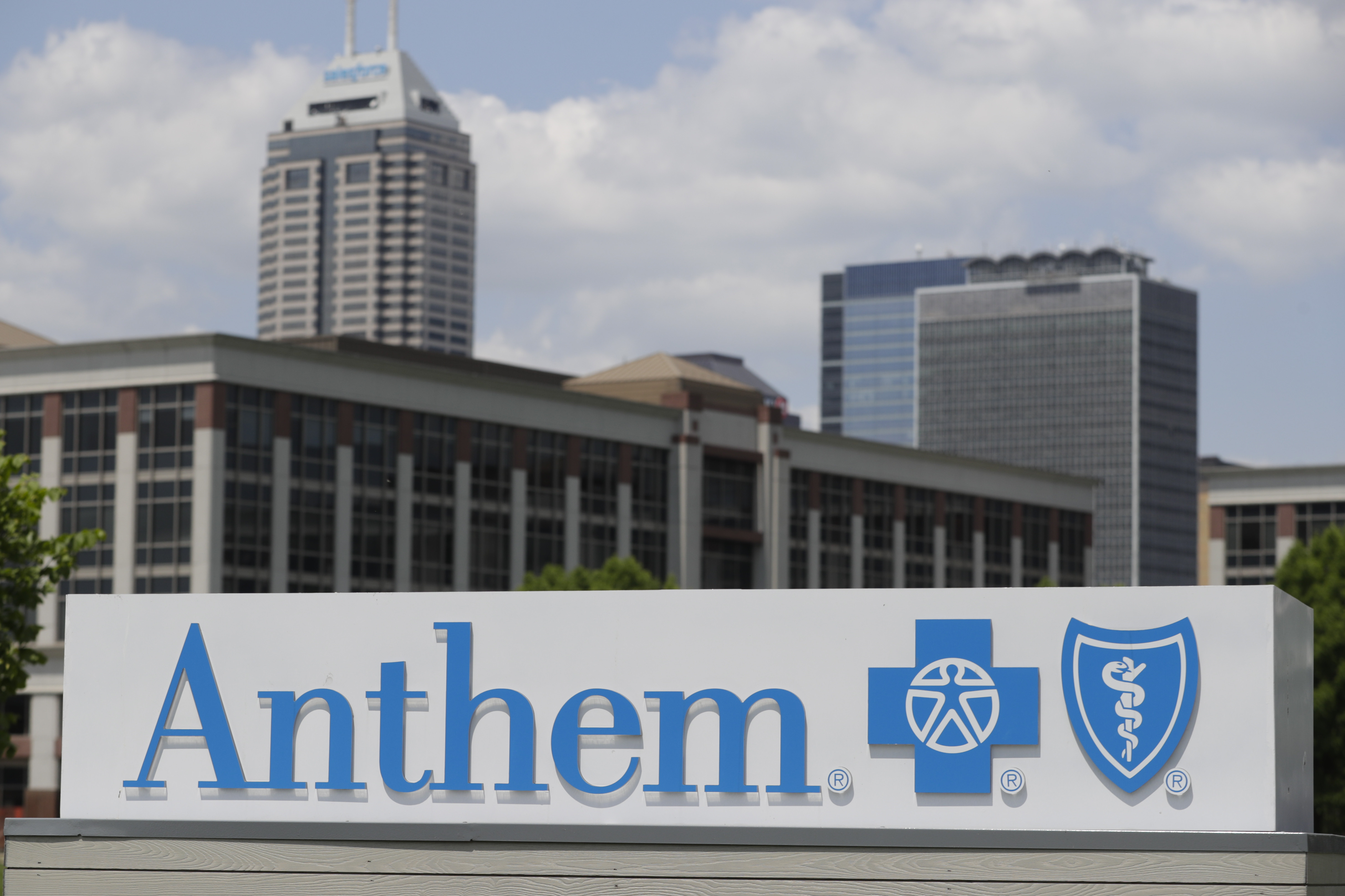 Signage is displayed the outside of the corporate headquarters building of health insurance company Anthem in Indianapolis, Tuesday, May 14, 2019. (AP Photo/Michael Conroy, File)