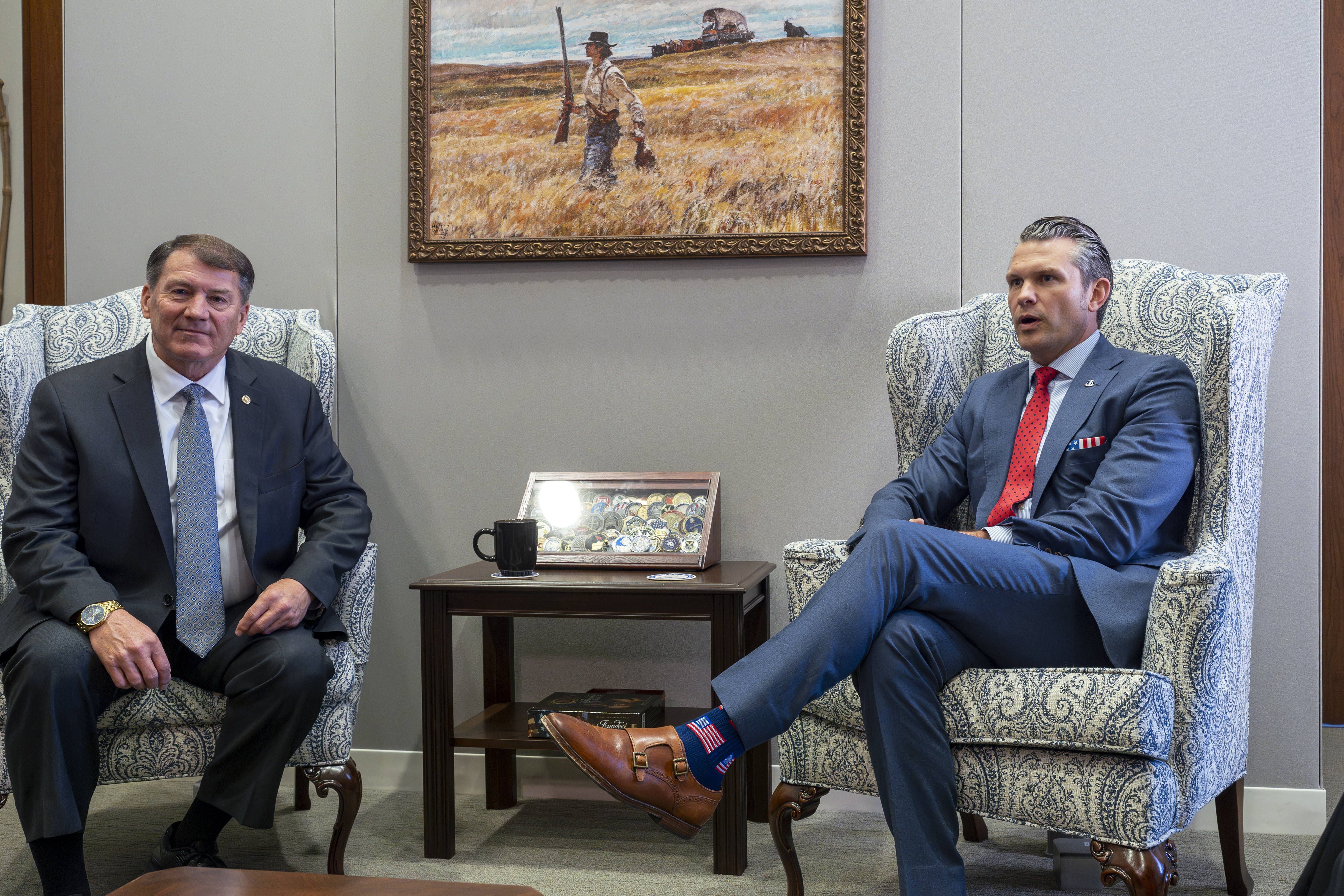 Sen. Mike Rounds, R-S.D., a member of the Senate Armed Services Committee, left, meets with Pete Hegseth, President-elect Donald Trump's nominee to be defense secretary, at the Capitol in Washington, Thursday, Dec. 5, 2024. (AP Photo/J. Scott Applewhite)