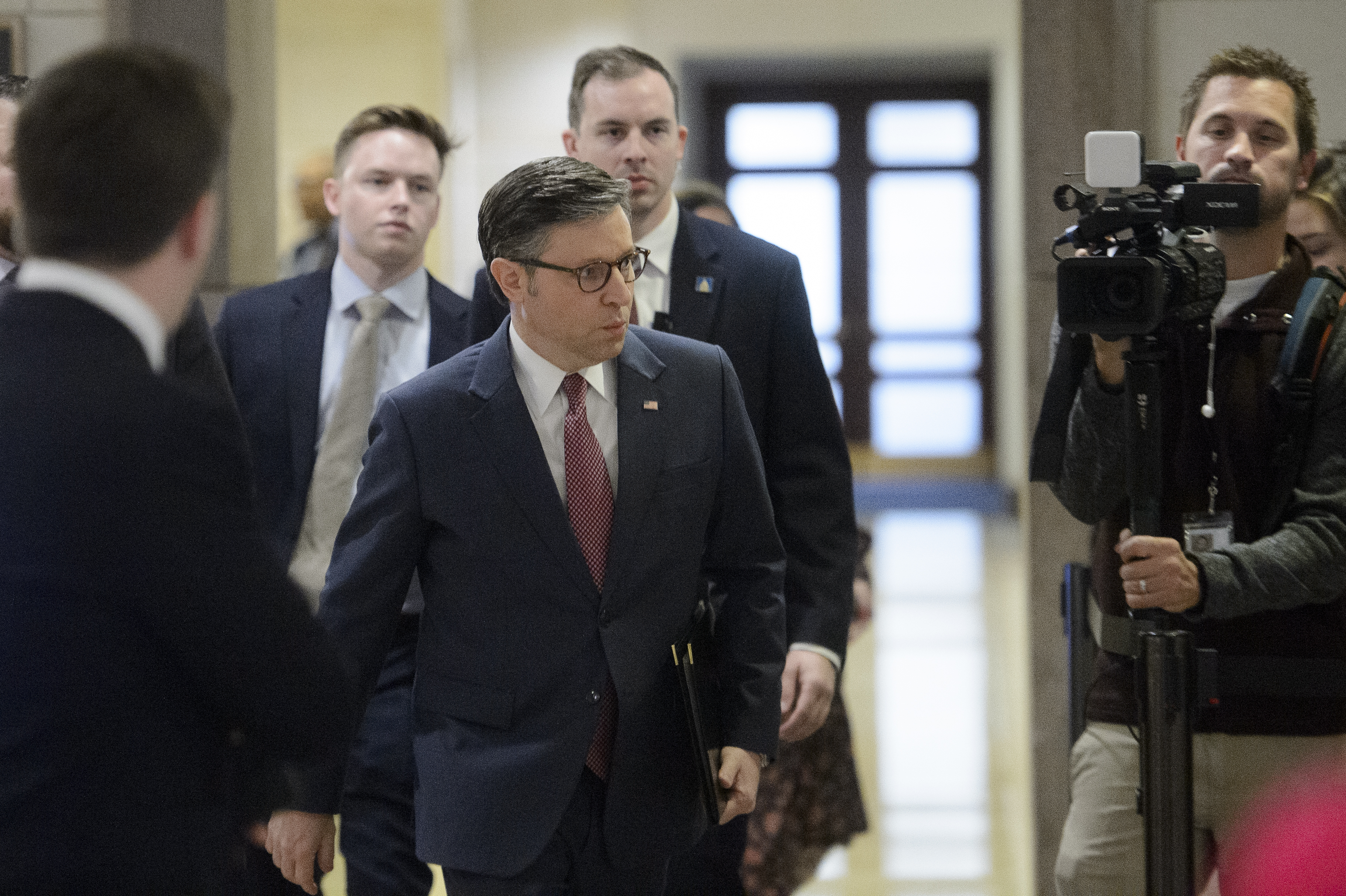 Speaker of the House Mike Johnson, R-La., arrives for a roundtable meeting with Elon Musk and Vivek Ramaswamy, President-elect Donald Trump's picks for the planned Department of Government Efficiency, at the Capitol, Thursday, Dec. 5, 2024, in Washington. (AP Photo/Rod Lamkey, Jr.