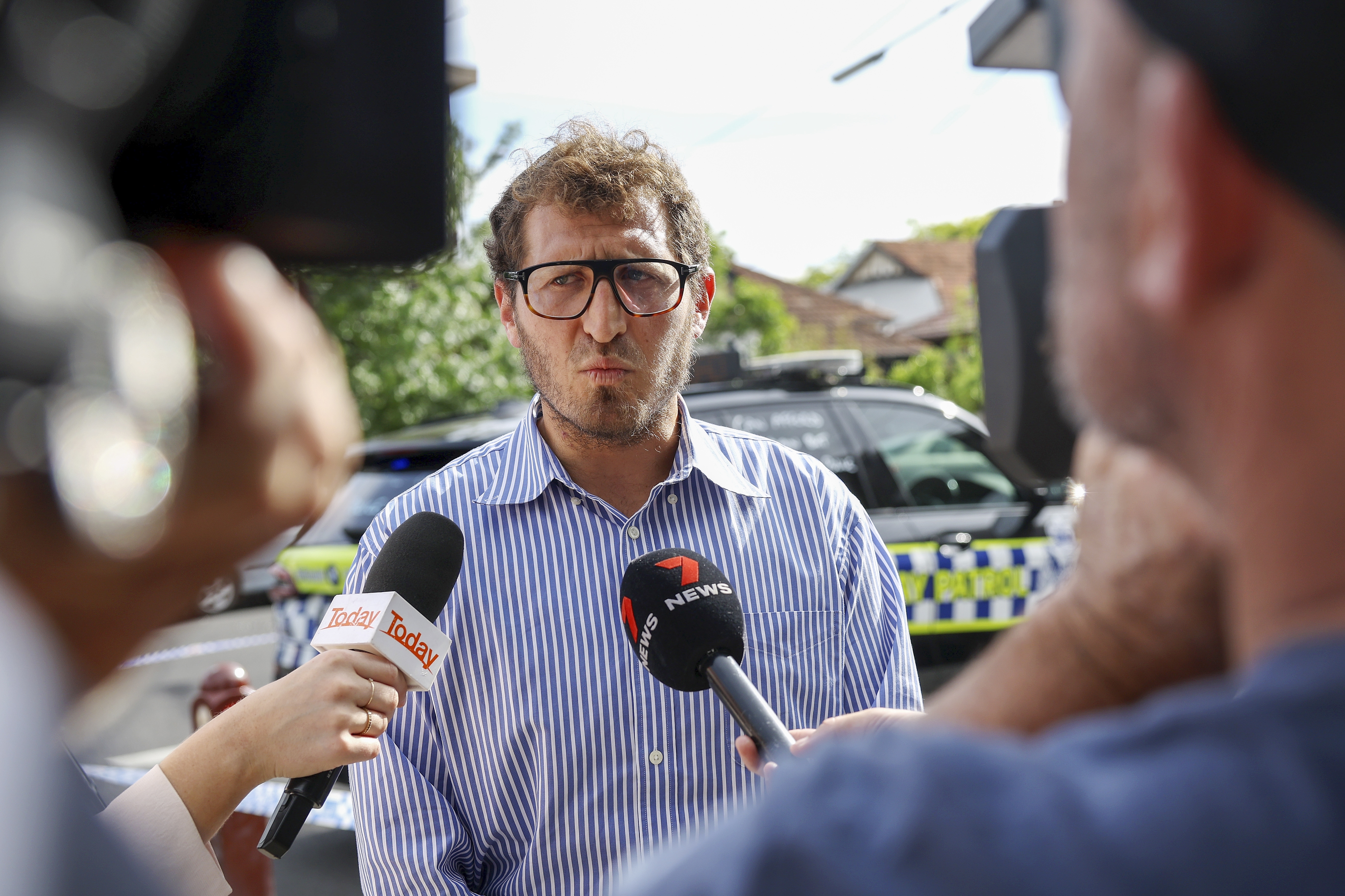 Rabbi Gabi Kaltmann speaks to the media at the scene of a fire at Adass Israel Synagogue in the suburb of Ripponlea, Melbourne, Australia, Friday, Dec. 6, 2024. (Con Chronis/AAP Image via AP)