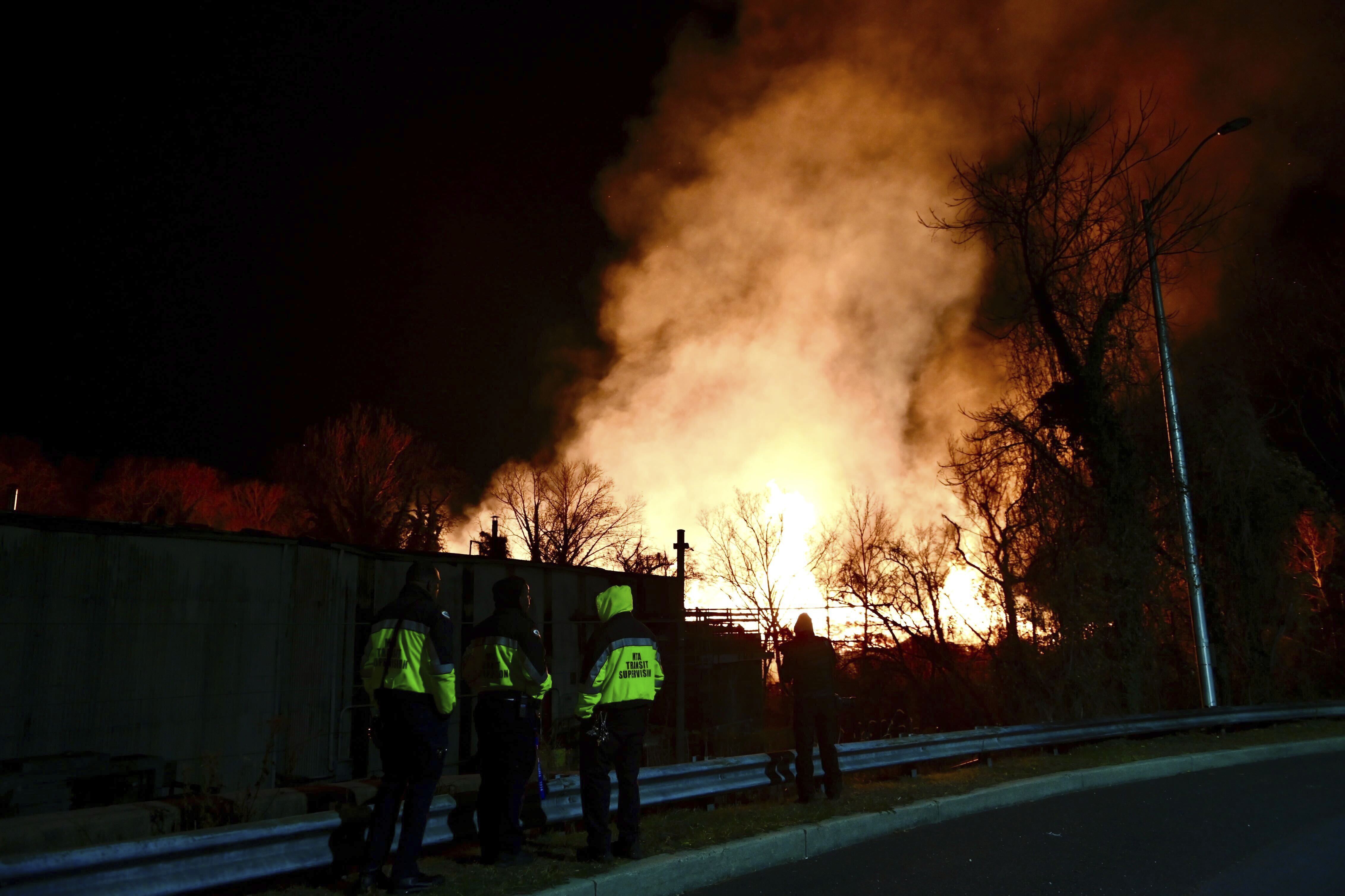 Firefighters respond to a wood fire Thursday, Dec. 5, 2024, in the Woodberry neighborhood in north Baltimore. (Kenneth K. Lam/The Baltimore Sun via AP)