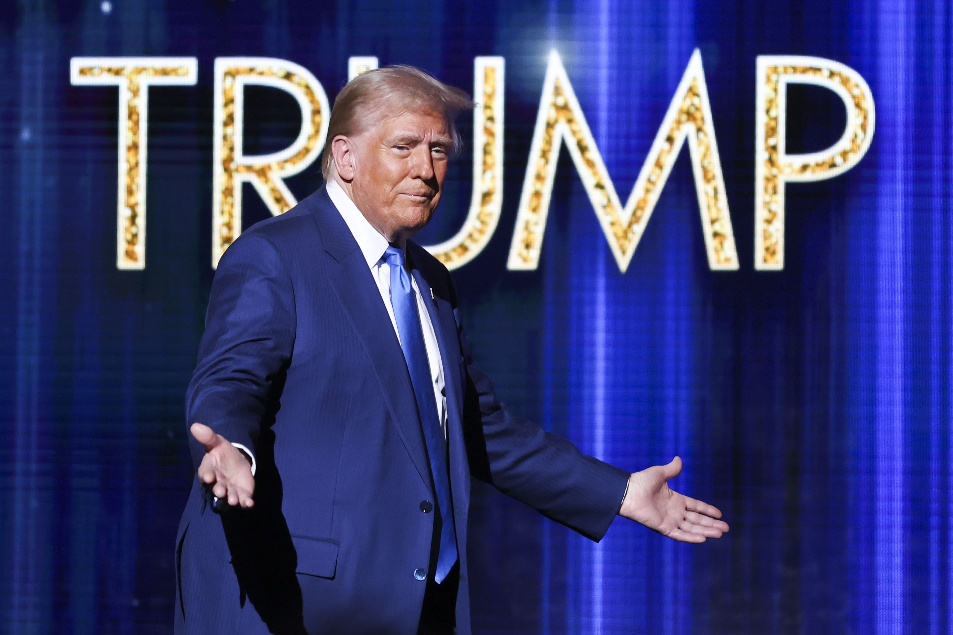 President-elect Donald Trump takes the stage before he speaks at the FOX Nation Patriot Awards, Thursday, Dec. 5, 2024, in Greenvale, N.Y. (AP Photo/Heather Khalifa)