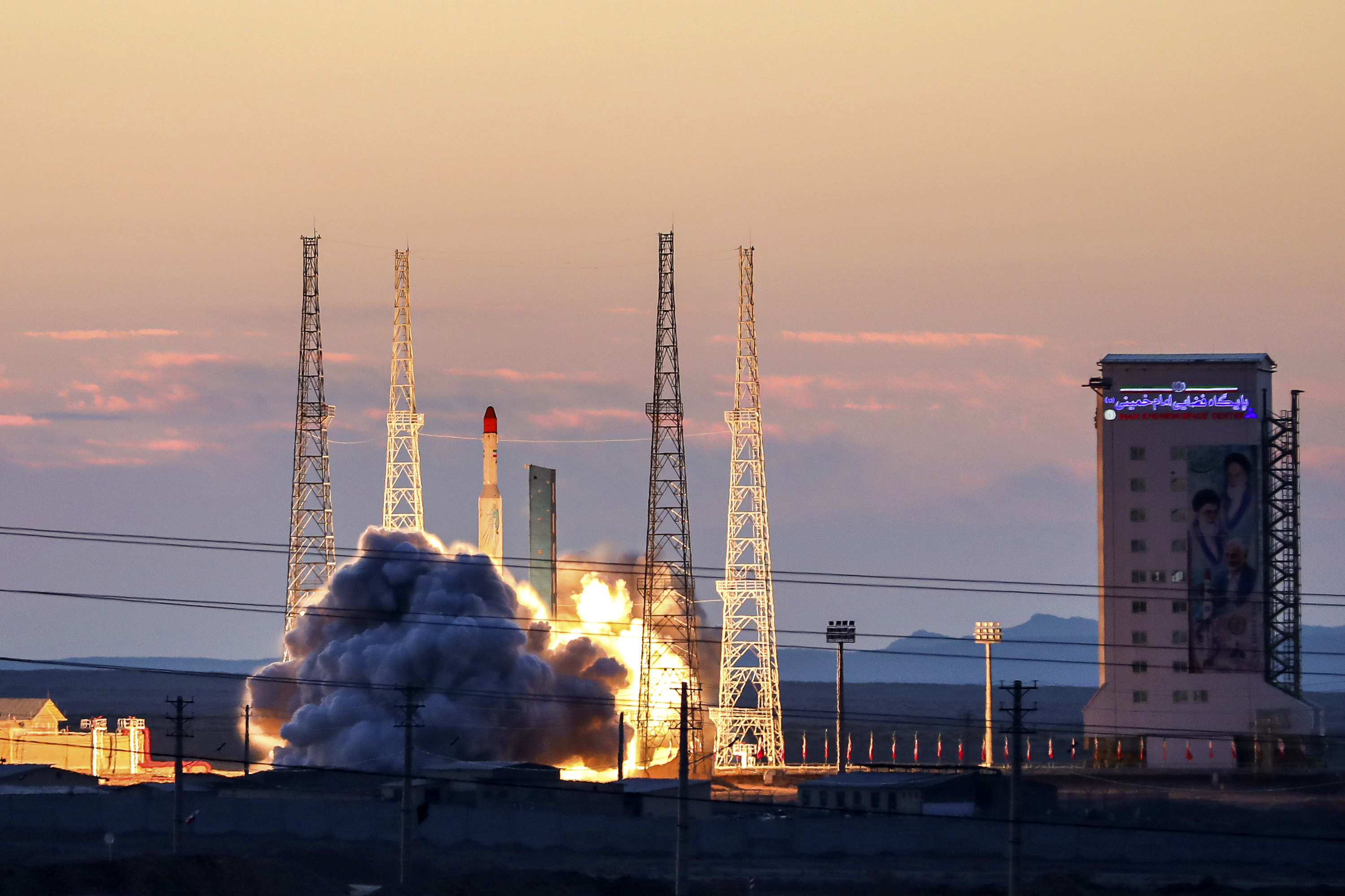 This photo released by the official website of the Iranian Defense Ministry on Friday, Dec. 6, 2024, shows the launching of Simorgh, or "Phoenix," rocket at Iran's Imam Khomeini Spaceport in rural Semnan province, Iran. (Iranian Defense Ministry via AP)