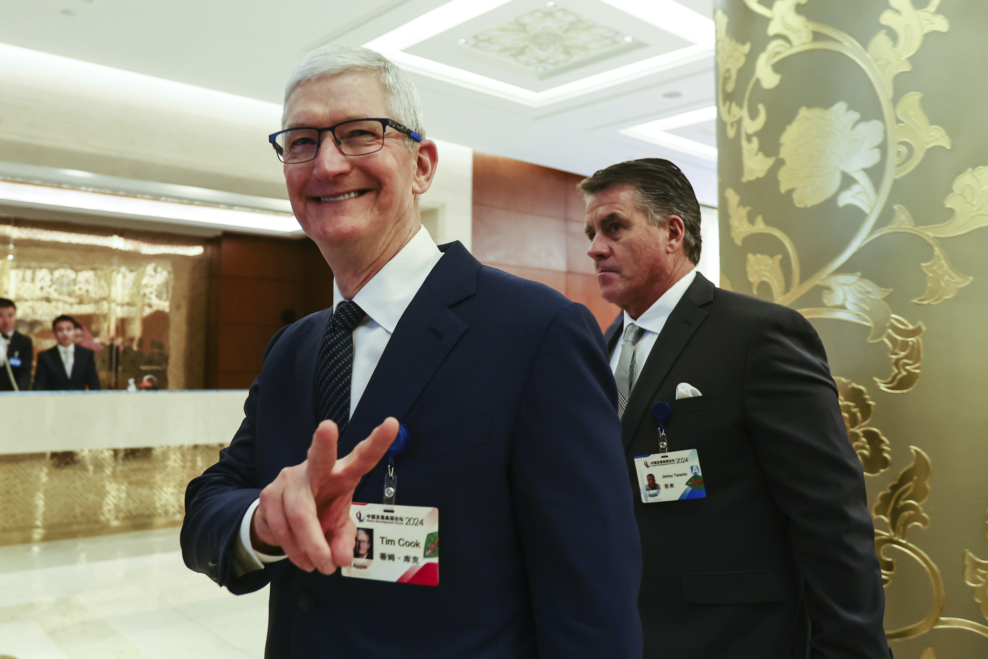 FILE - Apple CEO Tim Cook reacts at the annual meeting of the China Development Forum at the Diaoyutai Guesthouse in Beijing, China, March 24, 2024. (Wu Hao/Pool Photo via AP, File)