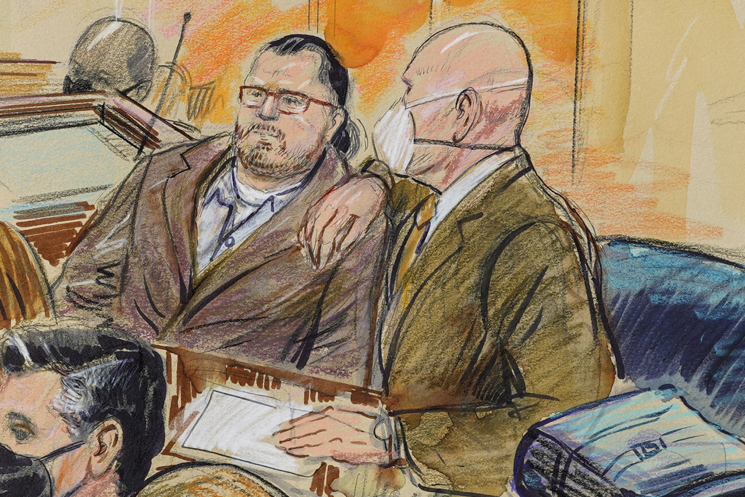 FILE - This artist sketch depicts Guy Wesley Reffitt, joined by his lawyer William Welch in Federal Court, in Washington, Feb. 28, 2022. (Dana Verkouteren via AP, File)