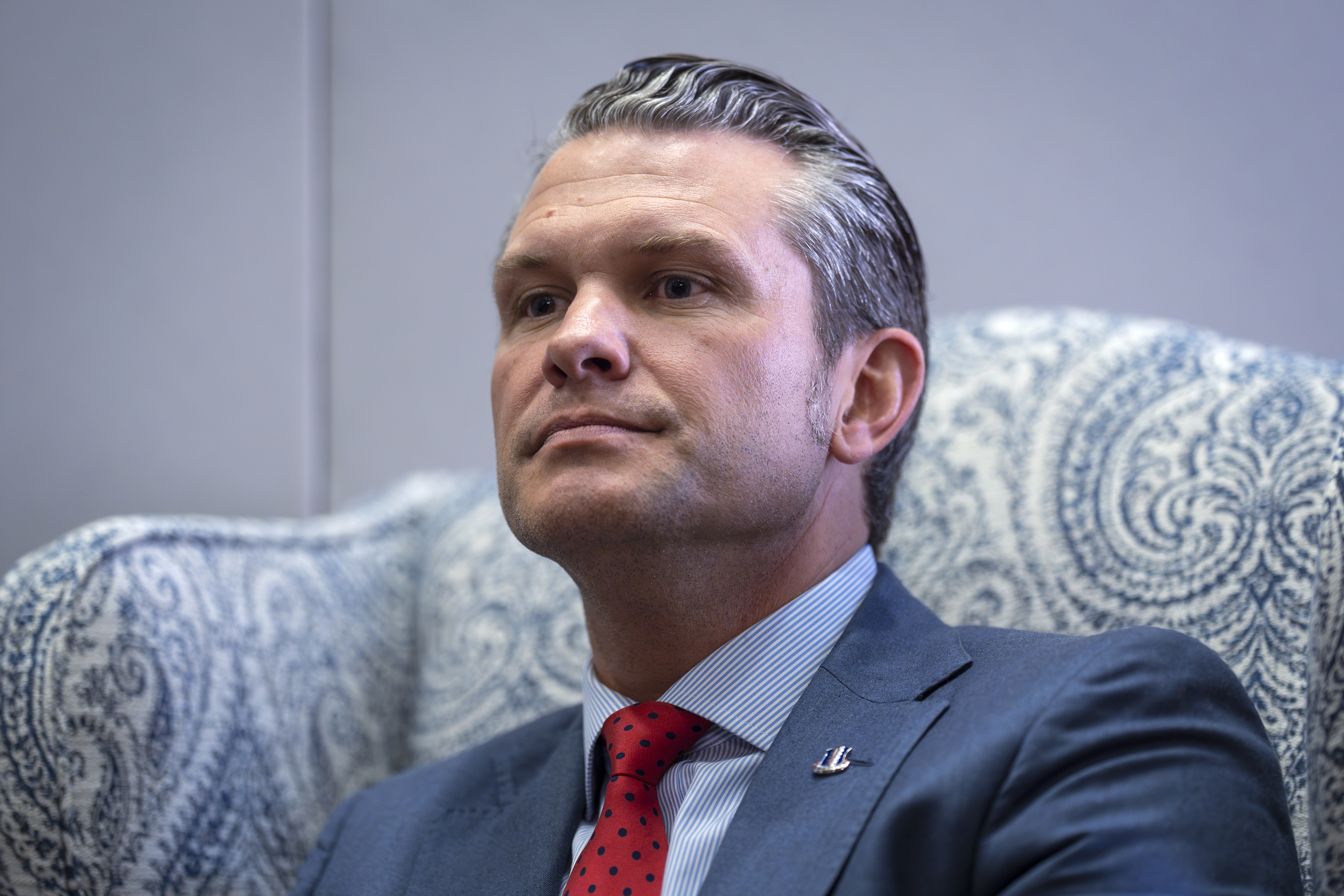 Pete Hegseth, President-elect Donald Trump's nominee to be defense secretary, responds to reporters during a meeting with Sen. Mike Rounds, R-S.D., a member of the Senate Armed Services Committee, at the Capitol in Washington, Thursday, Dec. 5, 2024. (AP Photo/J. Scott Applewhite)