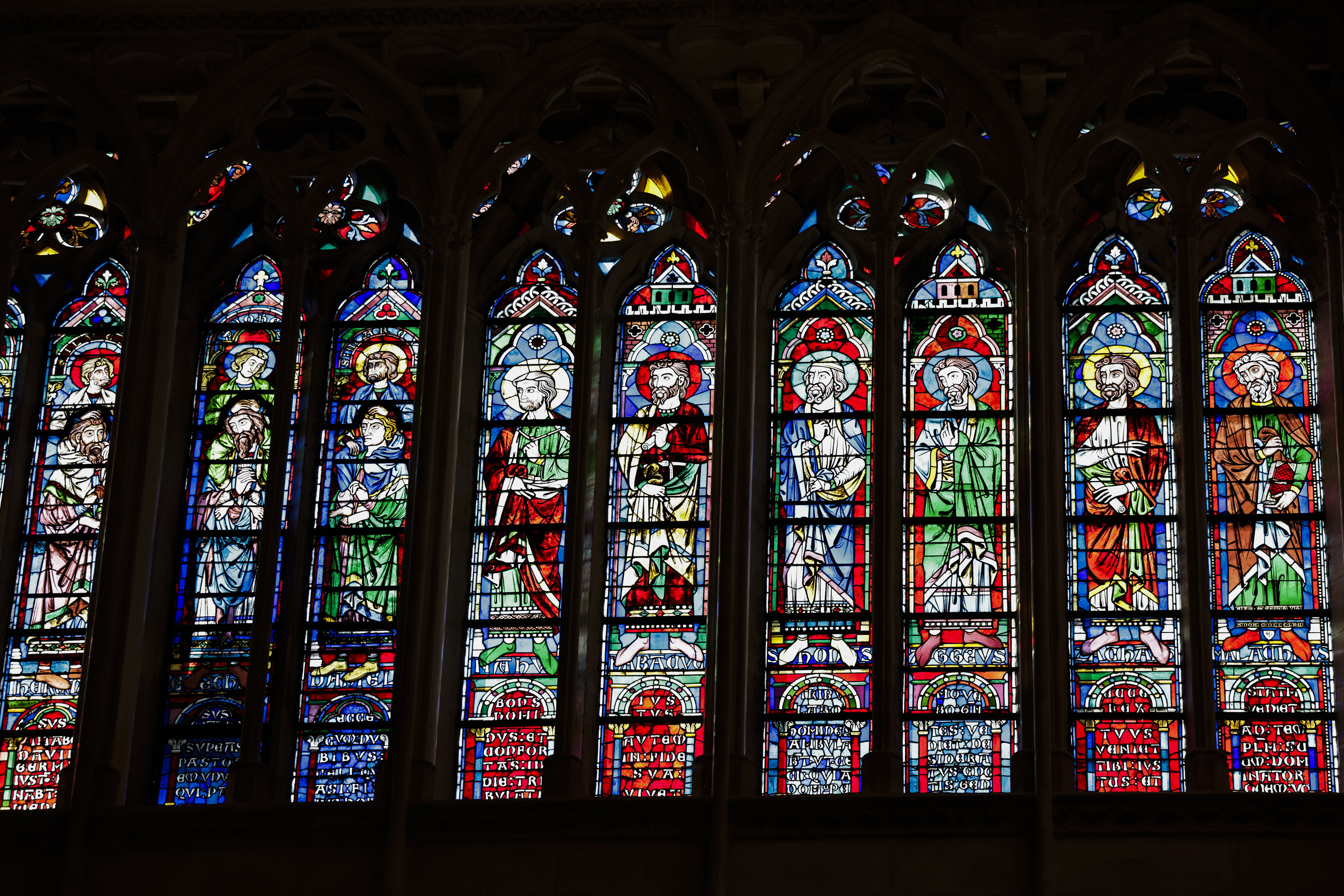 FILE - Stained glass windows are seen inside Notre-Dame de Paris cathedral while French President Emmanuel Macron visits the restored interiors of the monument, Friday Nov. 29, 2024, in Paris. (Stephane de Sakutin, Pool via AP, File)