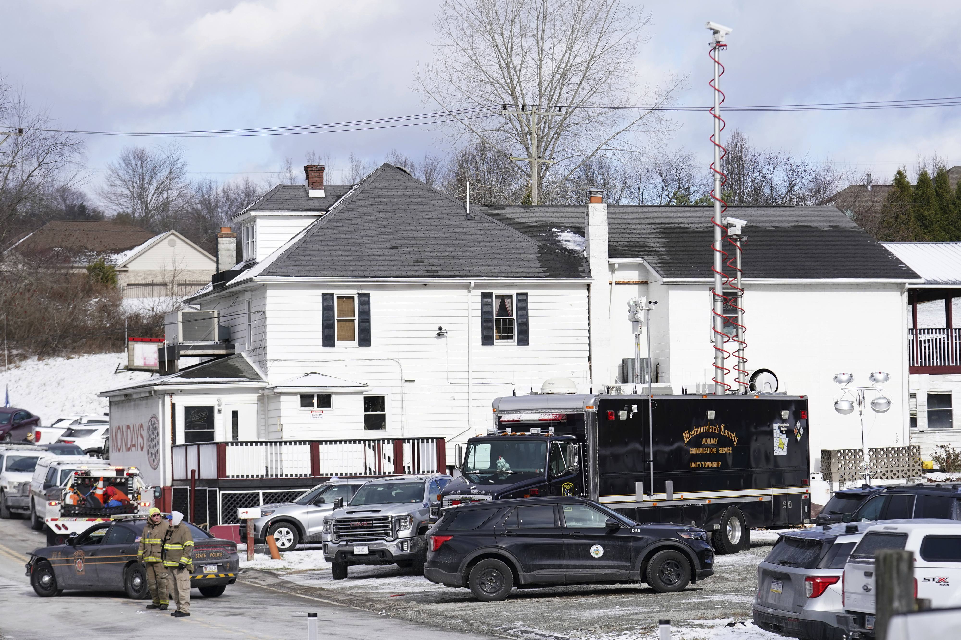 The scene, Friday, Dec. 6, 2024, where Elizabeth Pollard is believed to have disappeared in a sinkhole while looking for her cat, in Marguerite, Pa. (AP Photo/Matt Freed)