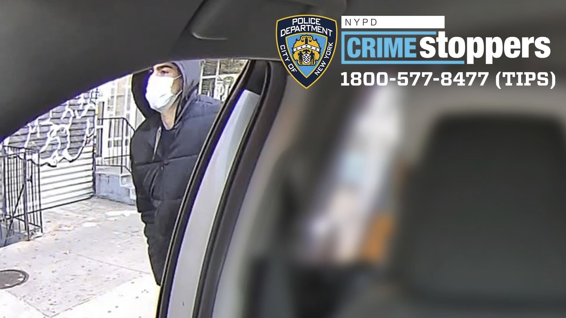 This photo released by the New York Police Department shows a suspect outside of a taxi after the fatal shooting of UnitedHealthcare CEO Brian Thompson on Dec. 4, 2024. Part of the image was blurred by the source. (NYPD via AP)