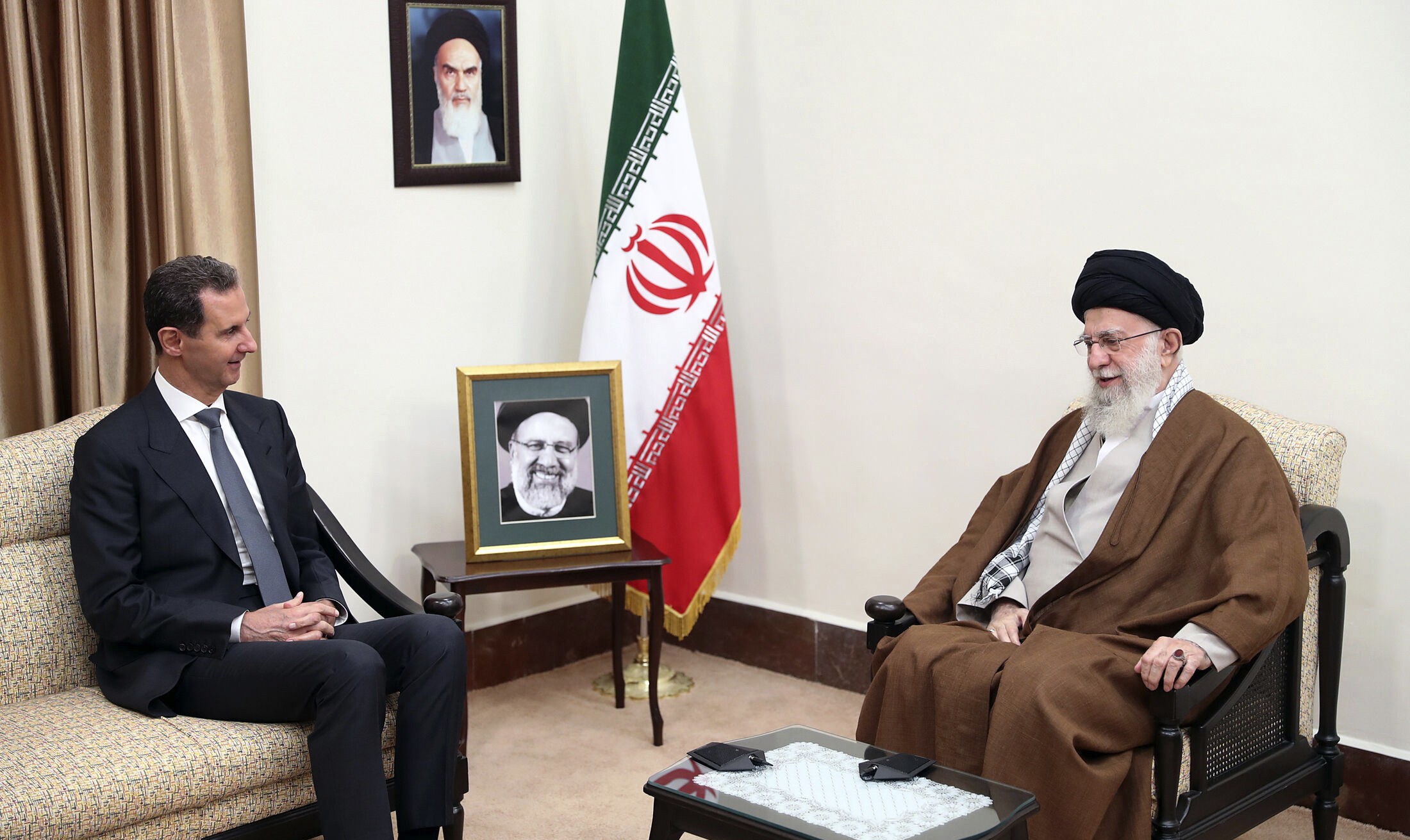 FILE - In this photo released by the official website of the office of the Iranian supreme leader, Supreme Leader Ayatollah Ali Khamenei, right, speaks with Syrian President Bashar Assad in a meeting in Tehran, Iran, Thursday, May 30, 2024. (Office of the Iranian Supreme Leader via AP, File)