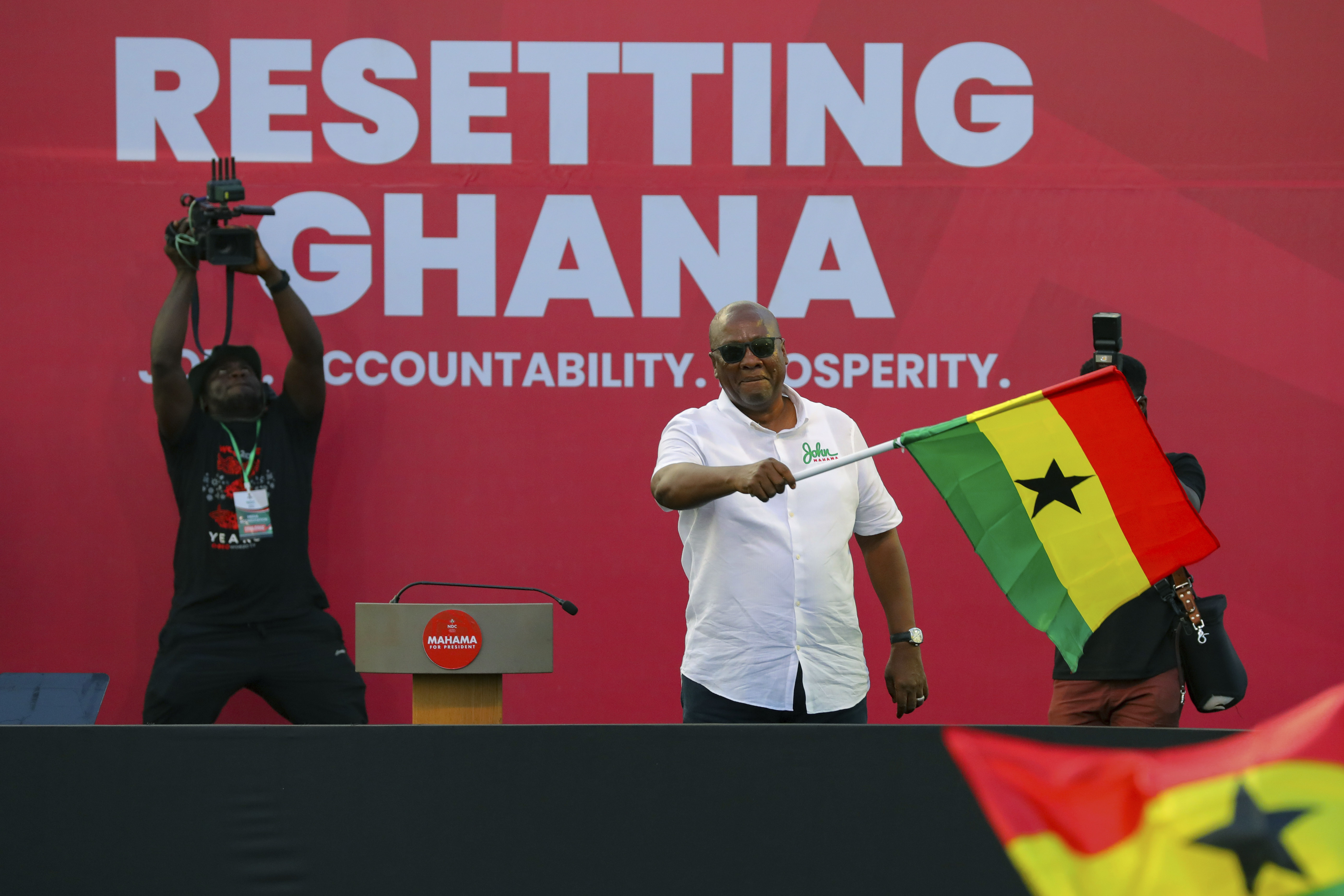 Former Ghana President and presidential candidate for the National Democratic Congress (NDC), John Mahama, gestures, at the party's final rally, in Accra, Ghana, Thursday, Dec. 5, 2024, ahead of the presidential election. (AP Photo/Misper Apawu)