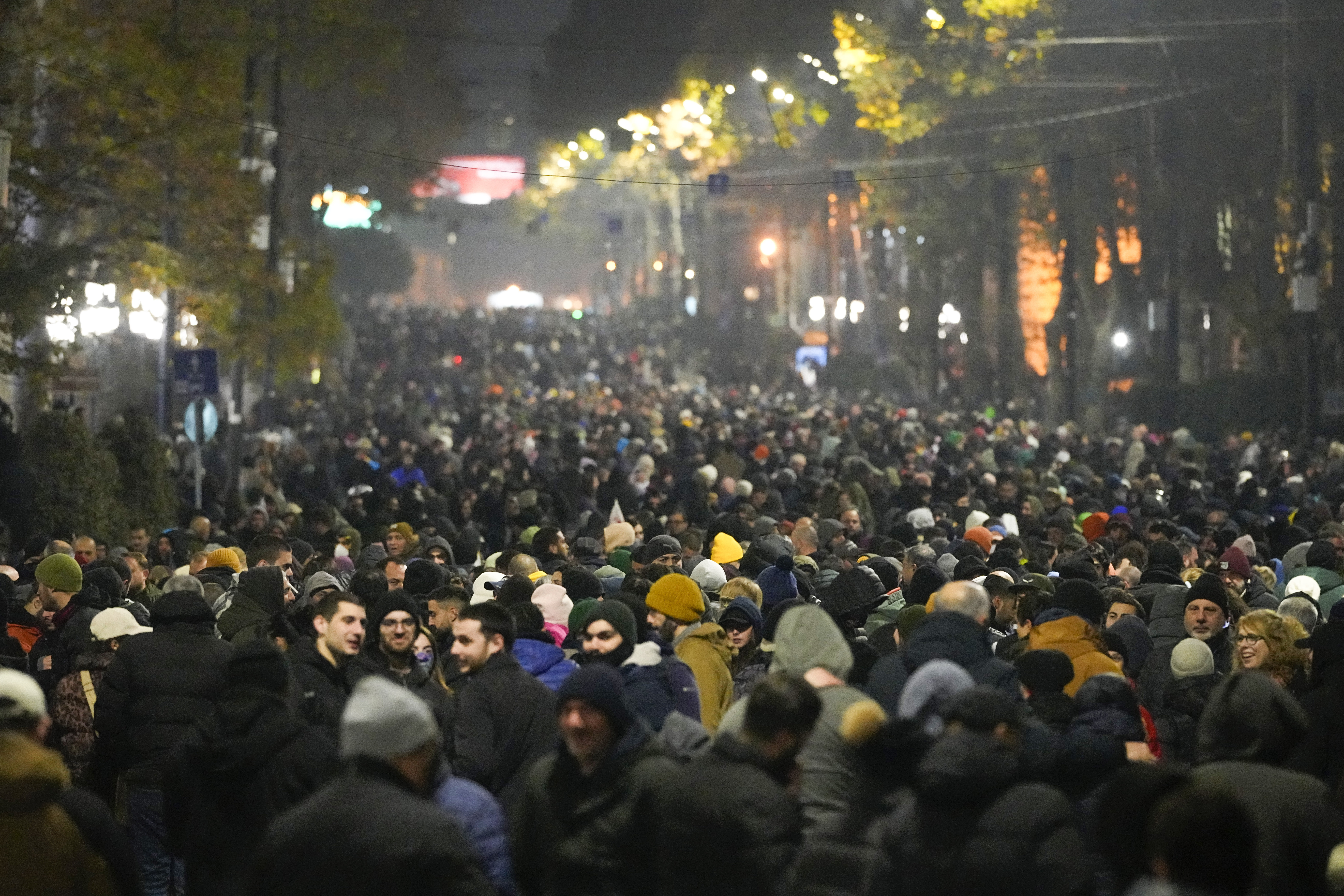 Demonstrators rally outside the parliament to protest against the government's decision to suspend negotiations on joining the European Union in Tbilisi, Georgia, Sunday, Dec. 8, 2024. (AP Photo/Pavel Bednyakov)