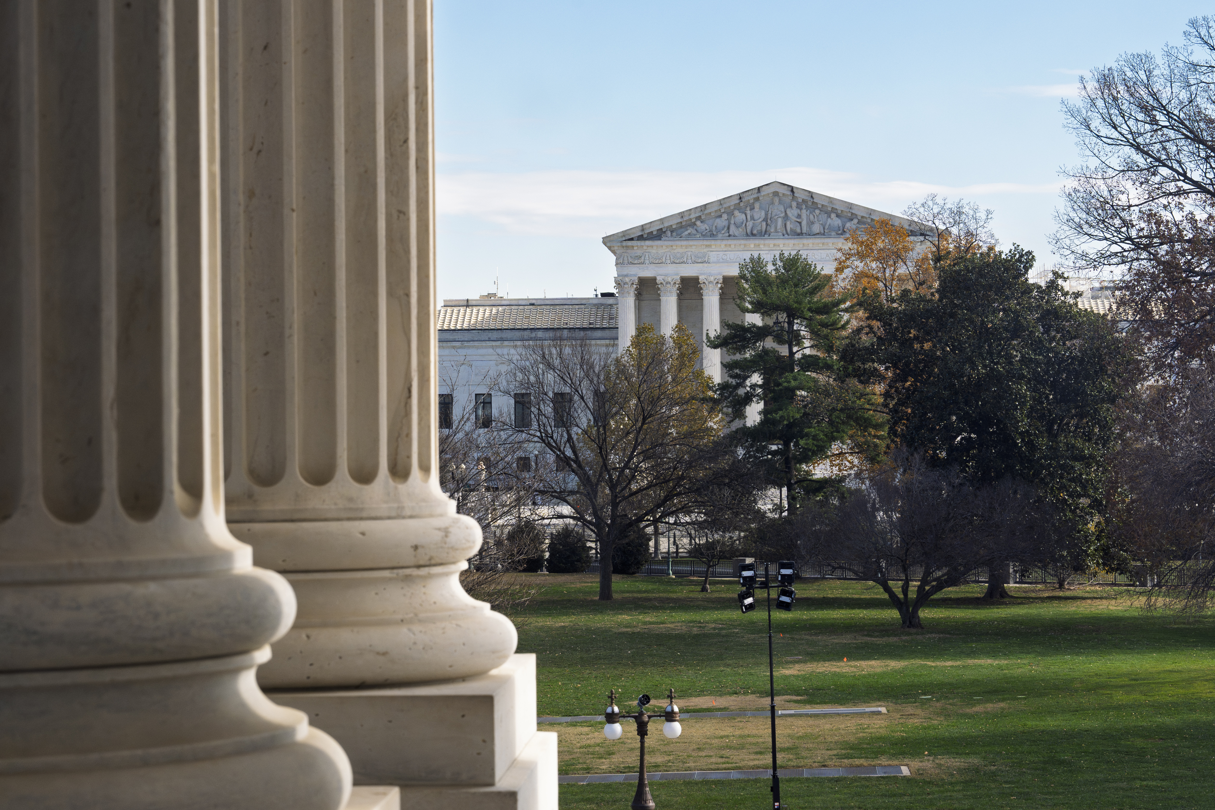 The Supreme Court is framed by the columns of the Capitol in Washington, Tuesday, Dec. 3, 2024. T (AP Photo/J. Scott Applewhite)