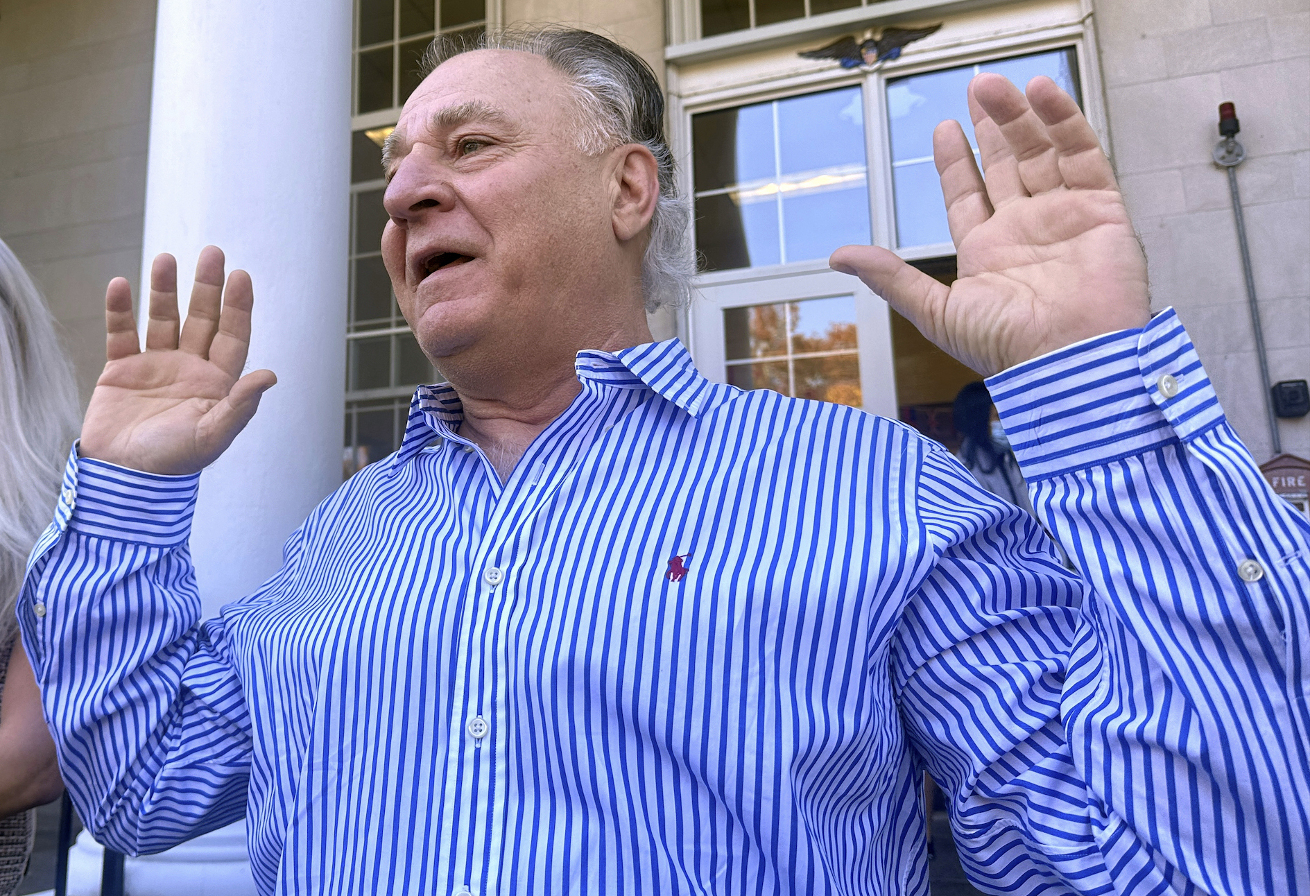 FILE - Richard Schiffer Jr. greets supporters on the steps outside Stoughton District Court, Oct. 23, 2024 in Stoughton, Mass. (AP Photo/Michael Casey, file)