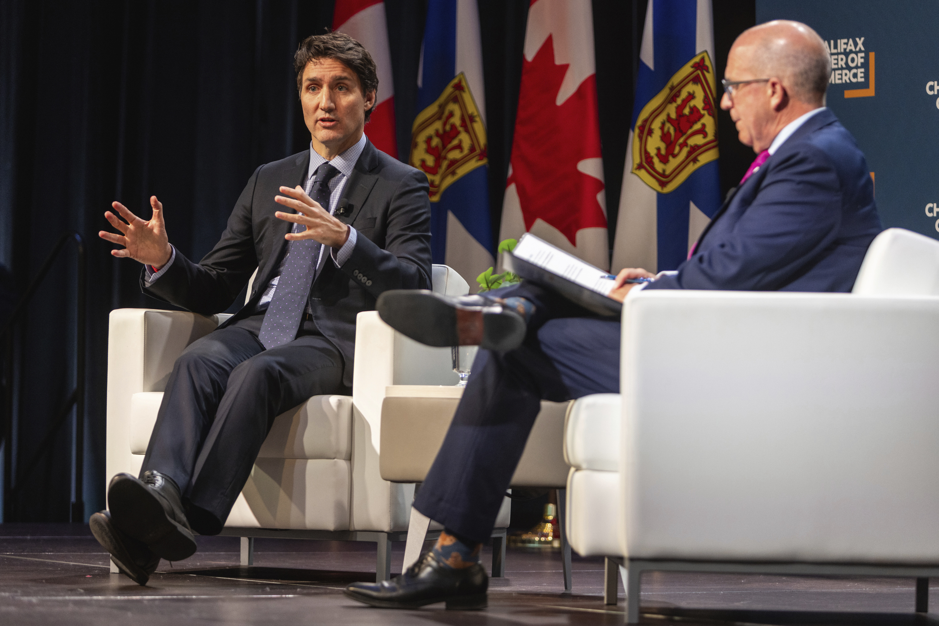 Canadian Prime Minister Justin Trudeau attends a fireside chat with the Halifax Chamber of Commerce in Halifax Monday Dec. 9, 2024. (Riley Smith/The Canadian Press via AP)