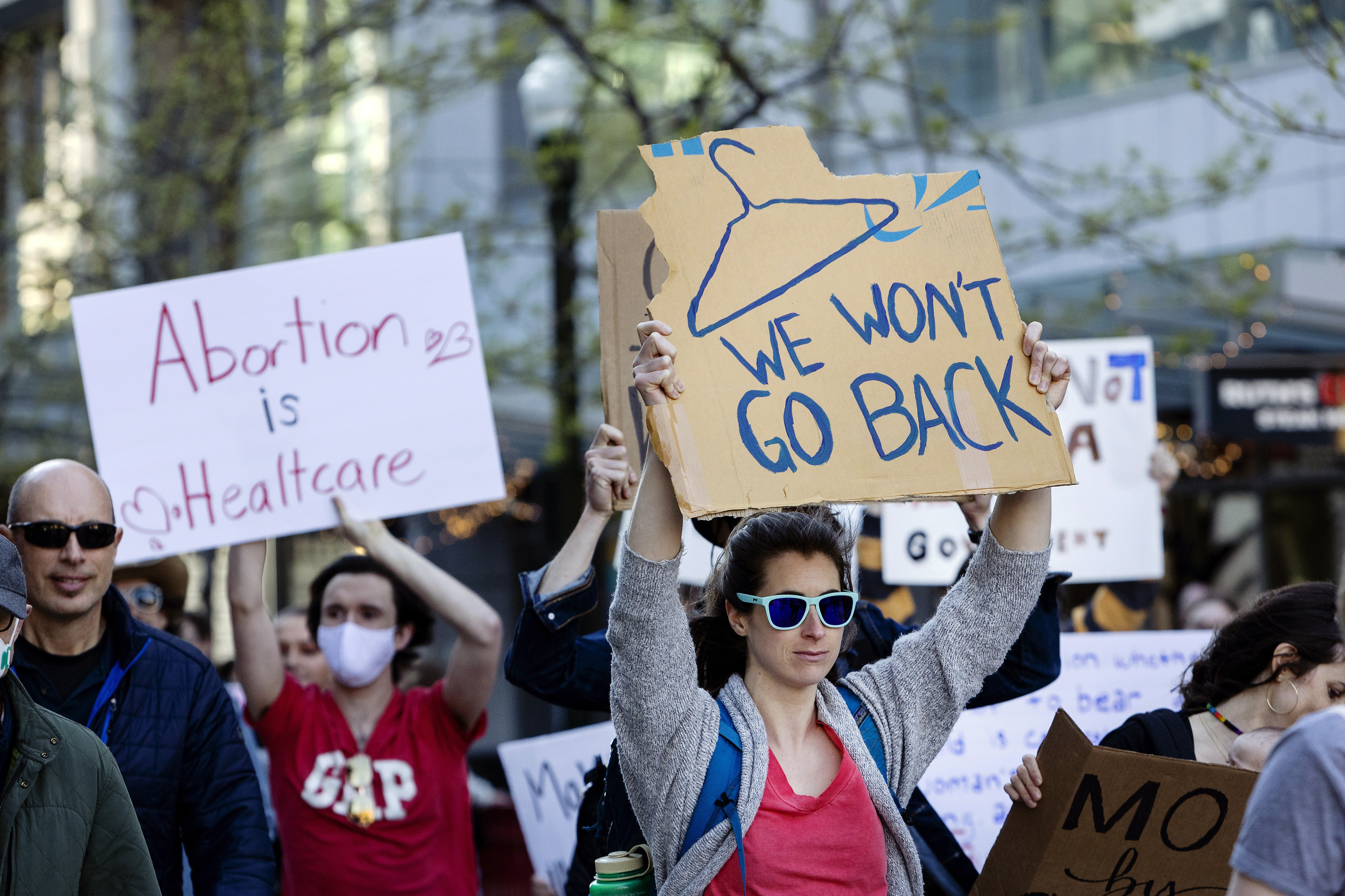 FILE - People march through 8th Street in downtown Boise, Idaho, on May 3, 2022, in response to the news that the U.S. Supreme Court could be poised to overturn the landmark Roe v. Wade case that legalized abortion nationwide. (Sarah A. Miller/Idaho Statesman via AP, File)