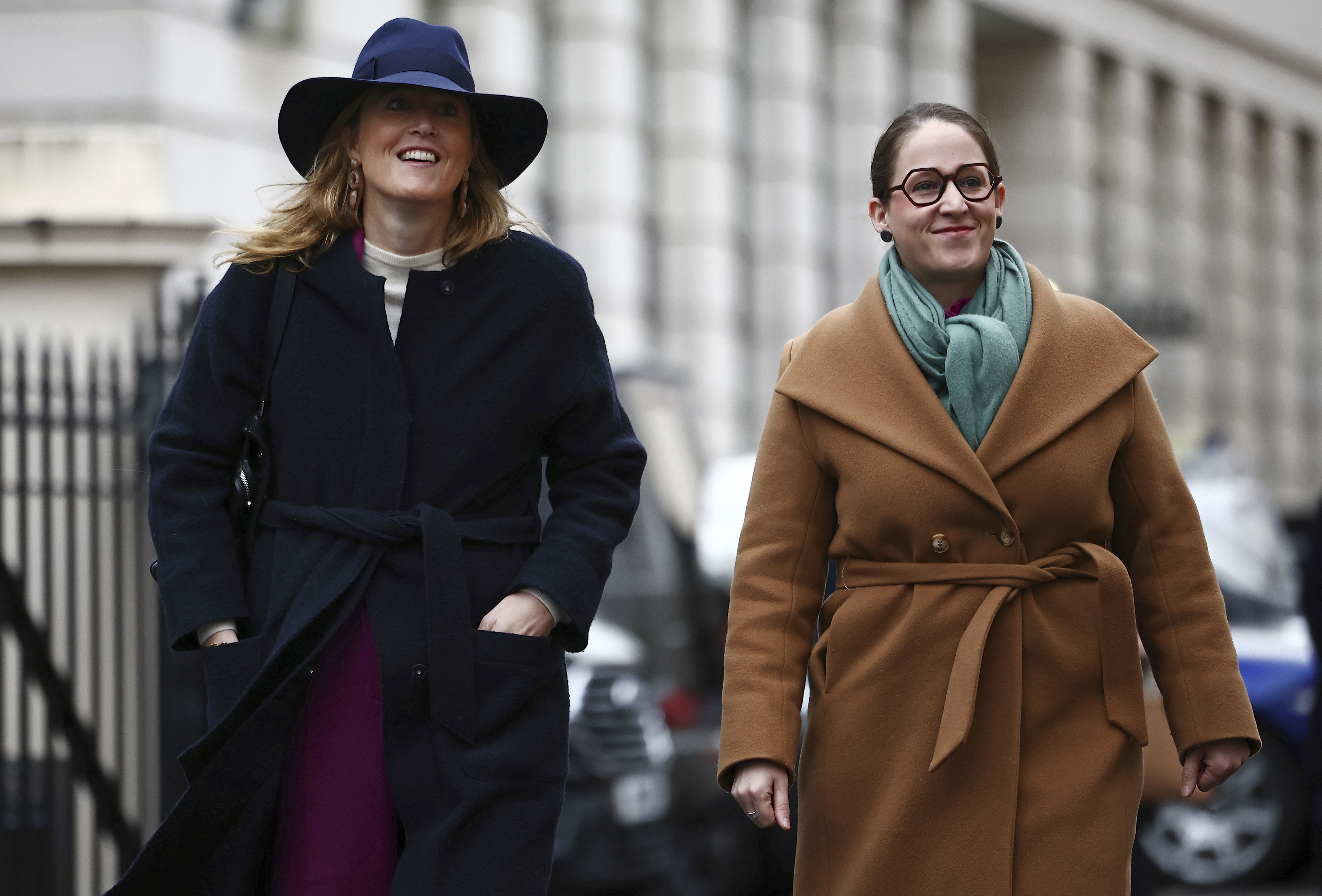 Belgium's Interior Minister Annelies Verlinden, left, and Belgium's Asylum and Migration Minister Nicole de Moor arrive for a meeting of European leaders and agencies at Carlton Gardens in London, Tuesday, Dec. 10, 2024. (Henry Nicholls/Pool Photo via AP)