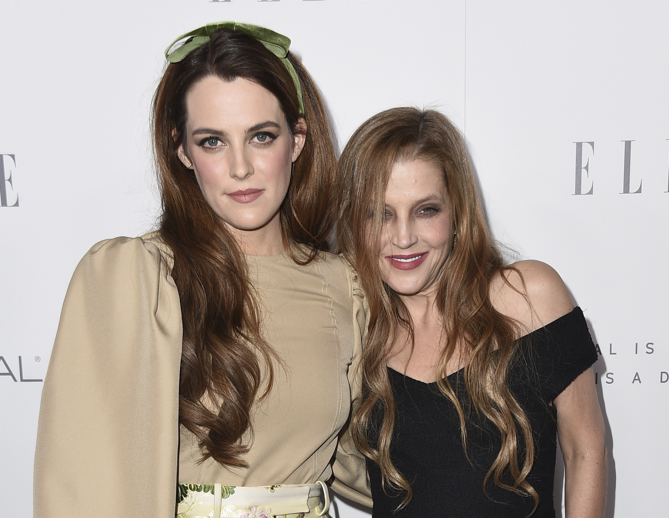 FILE - Riley Keough, left, and her mother Lisa Marie Presley arrive at the 24th annual ELLE Women in Hollywood Awards on Oct. 16, 2017, in Los Angeles. (Photo by Jordan Strauss/Invision/AP, File)