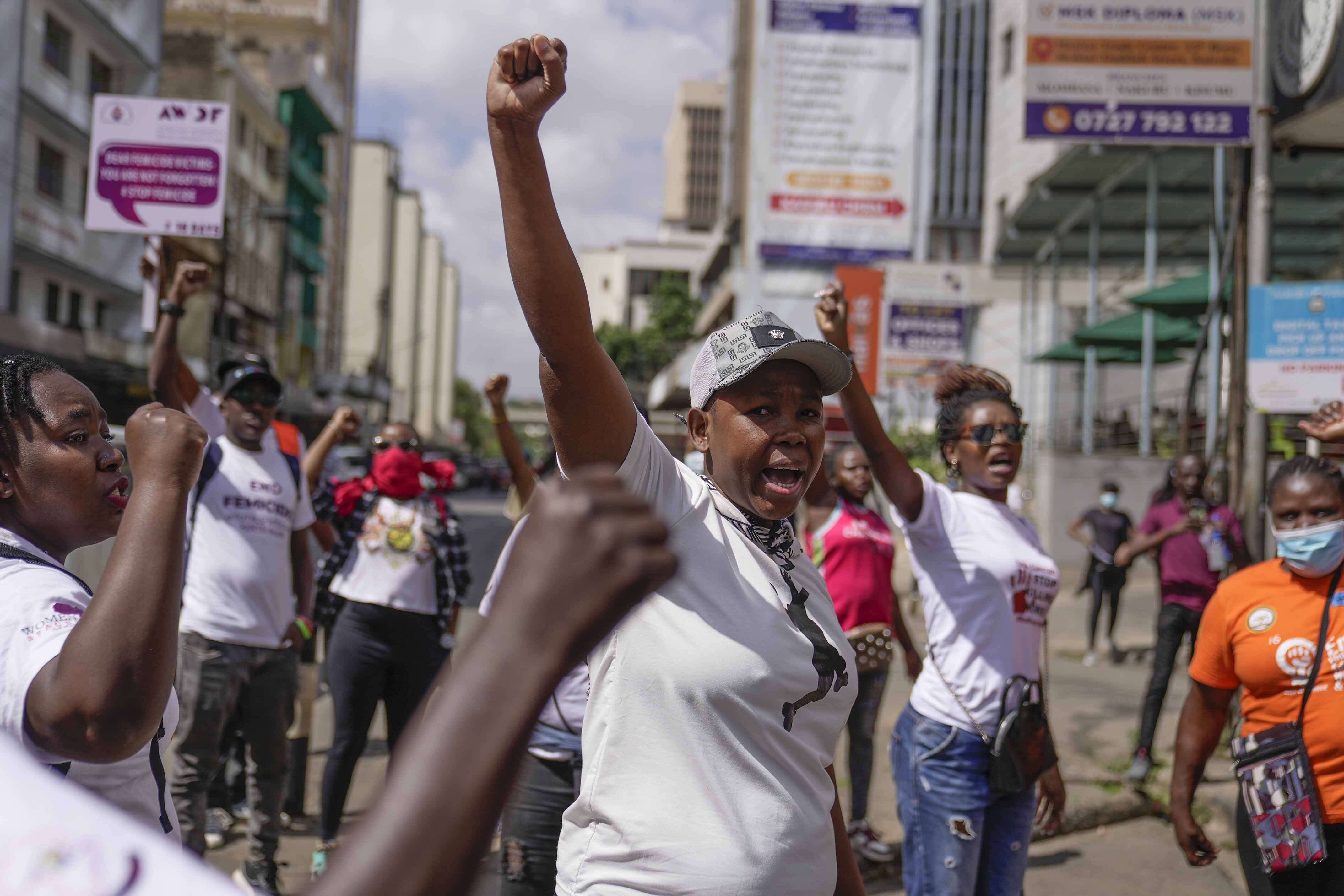 Demonstrators chant during the march against the rising cases of femicide, in downtown Nairobi, Kenya, Tuesday, Dec. 10, 2024. (AP Photo/Brian Inganga)