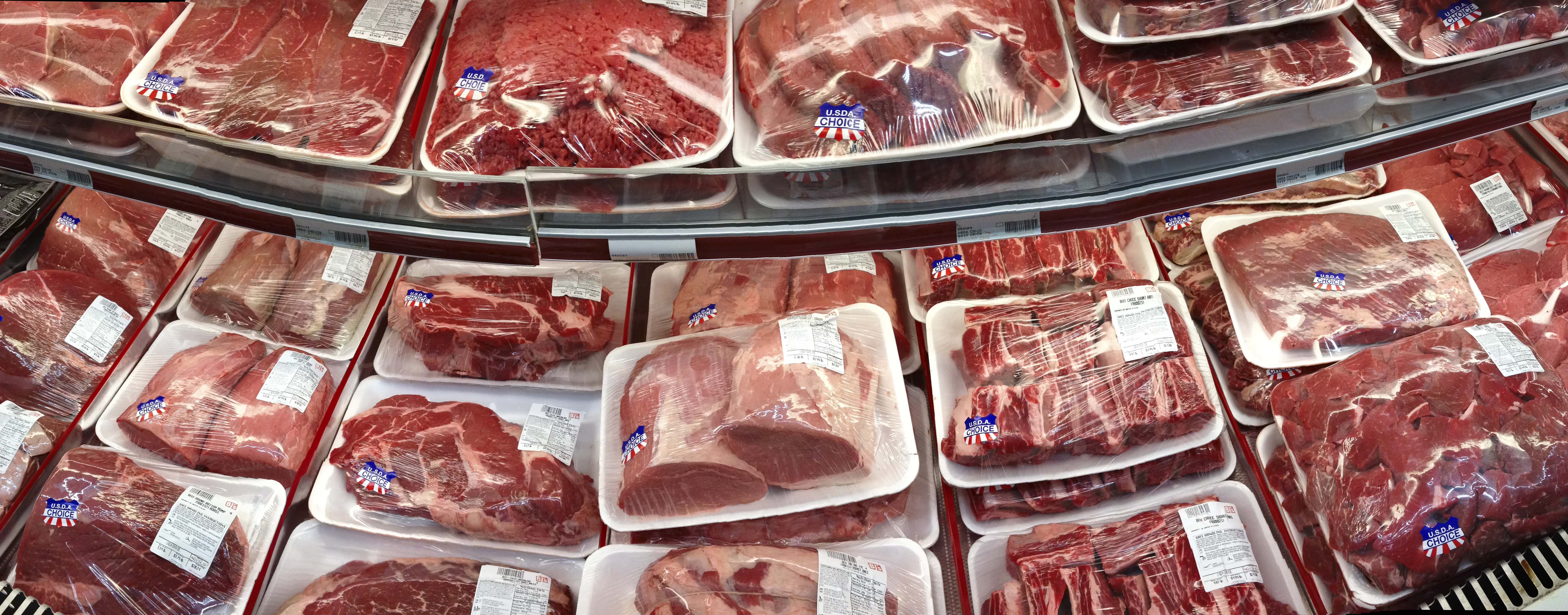 FILE - In this Nov. 2, 2013 file photo, various cuts of beef and pork are displayed for sale in the meat department at a discount market in Arlington, Va. (AP Photo/J. Scott Applewhite, File)